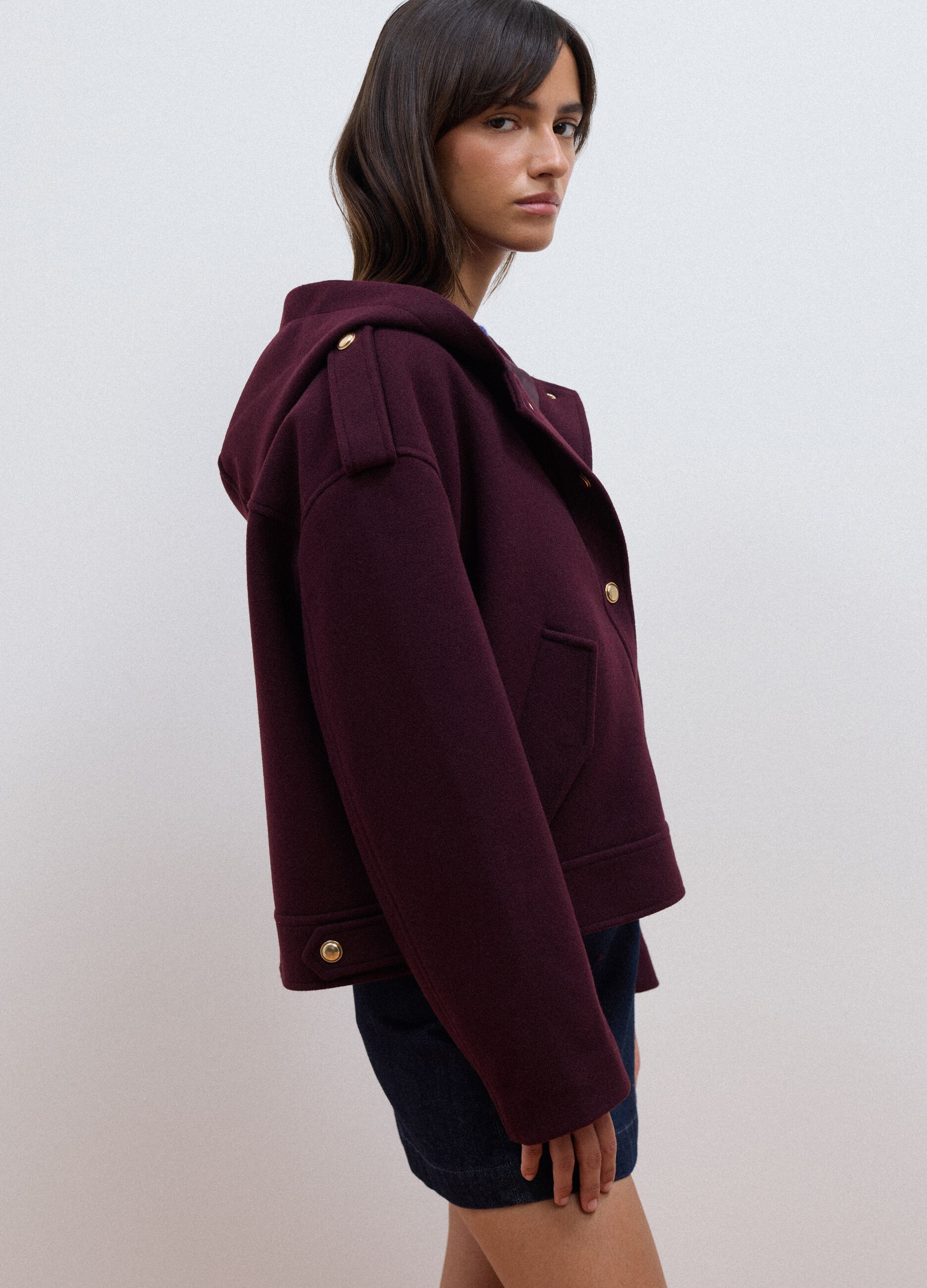 Purple hooded jacket with press-stud fastening