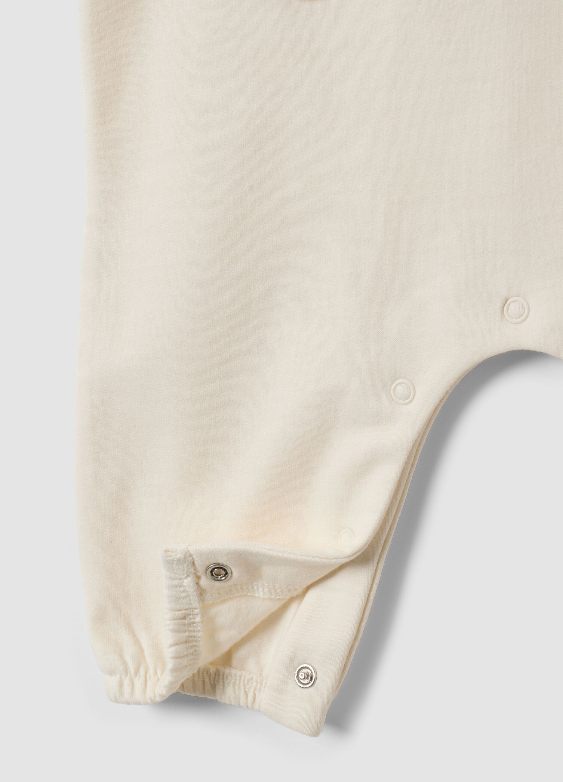 White organic cotton baby sleepsuit with Stitch print
