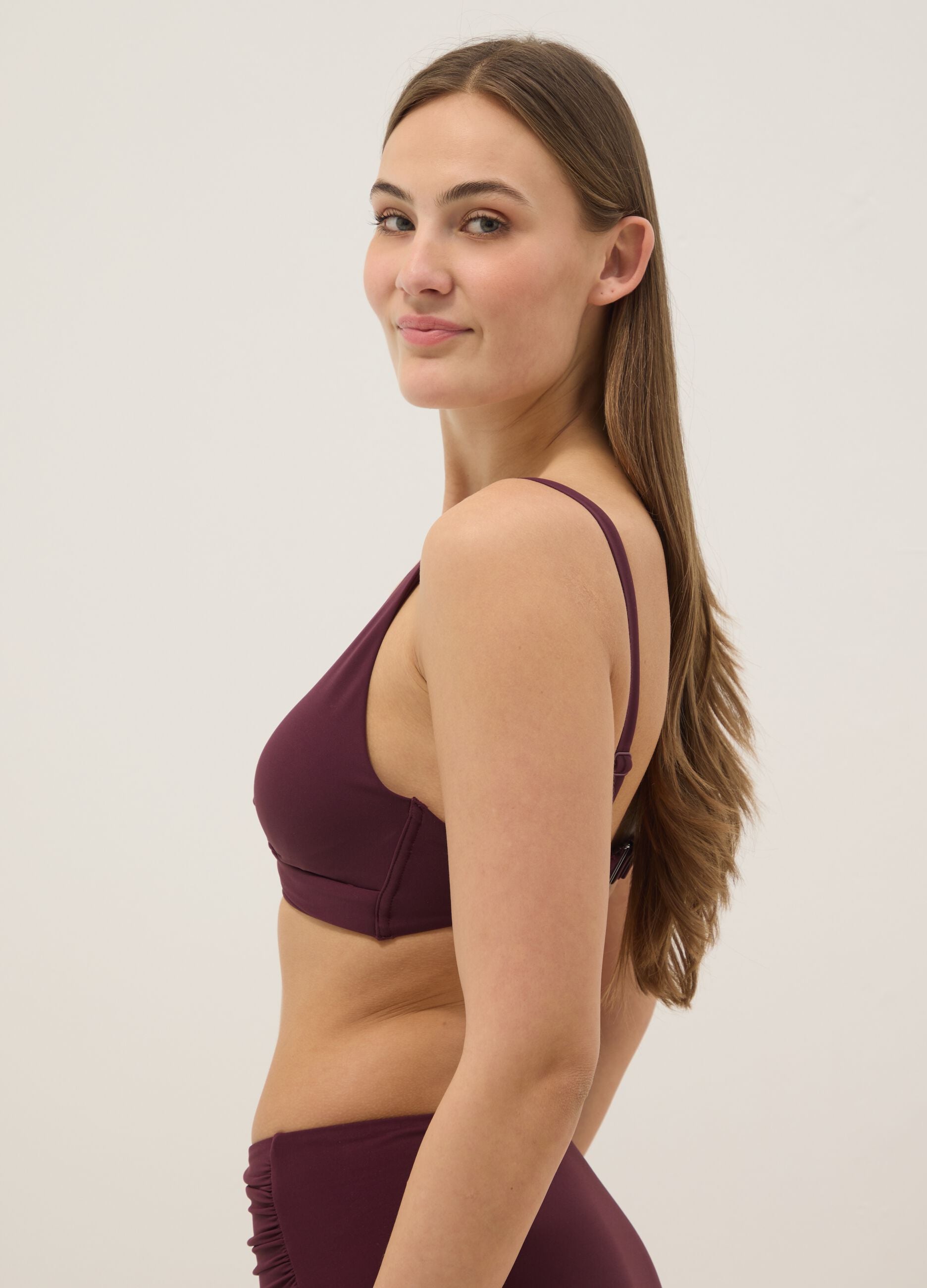 Purple triangle bikini top in stretch fabric with shaping effect