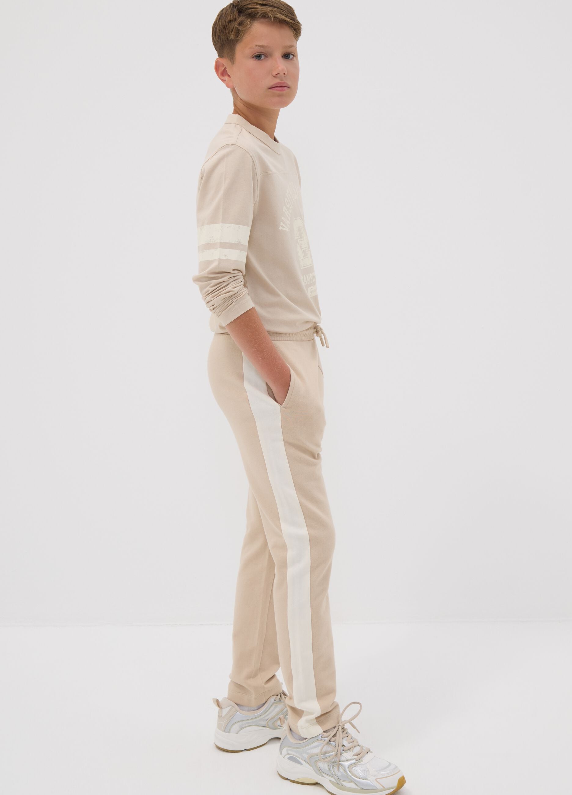 Beige pure cotton jogger trousers with side stripes for boys
