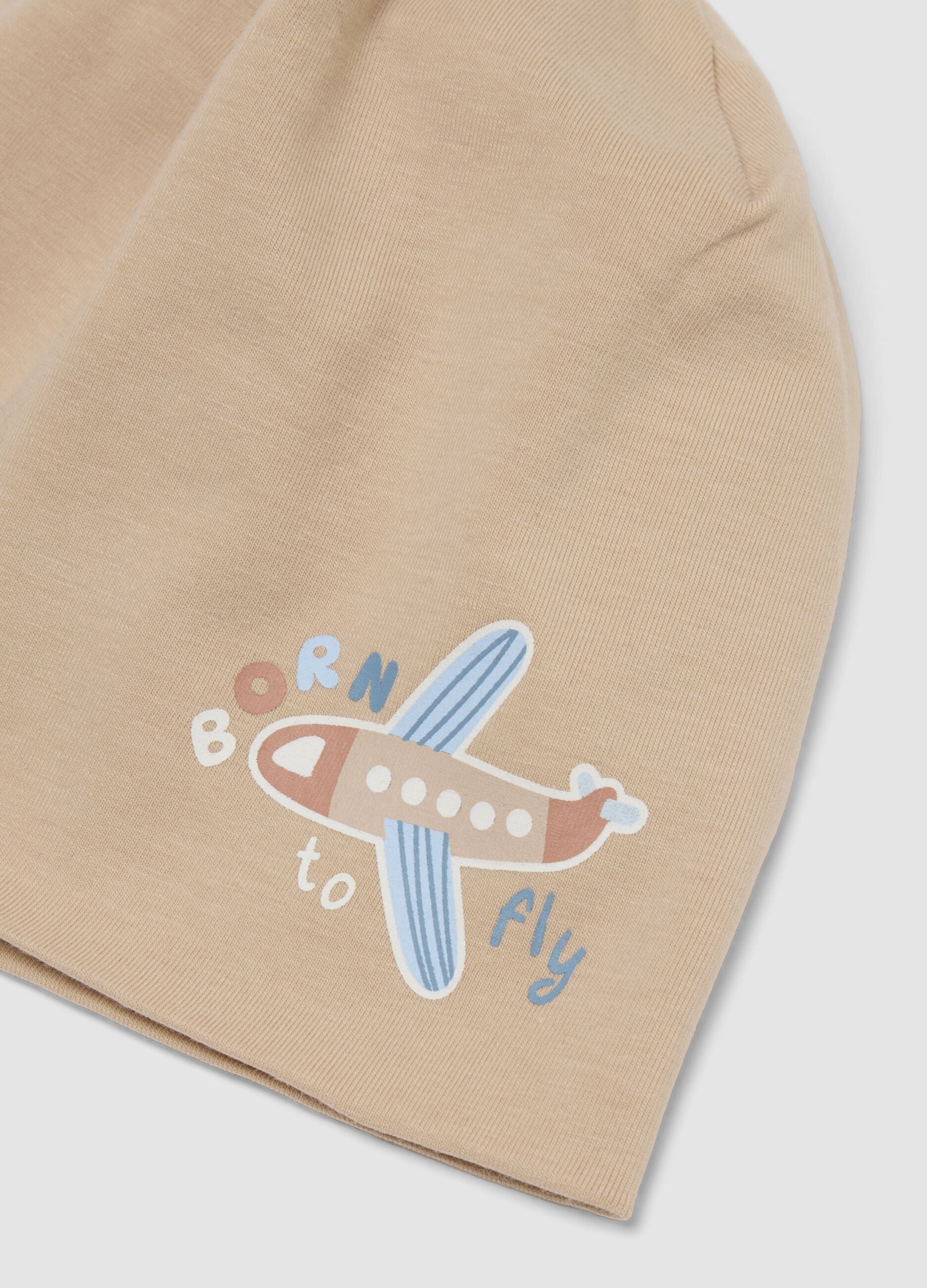 Beige stretch organic cotton baby hat with aeroplane print