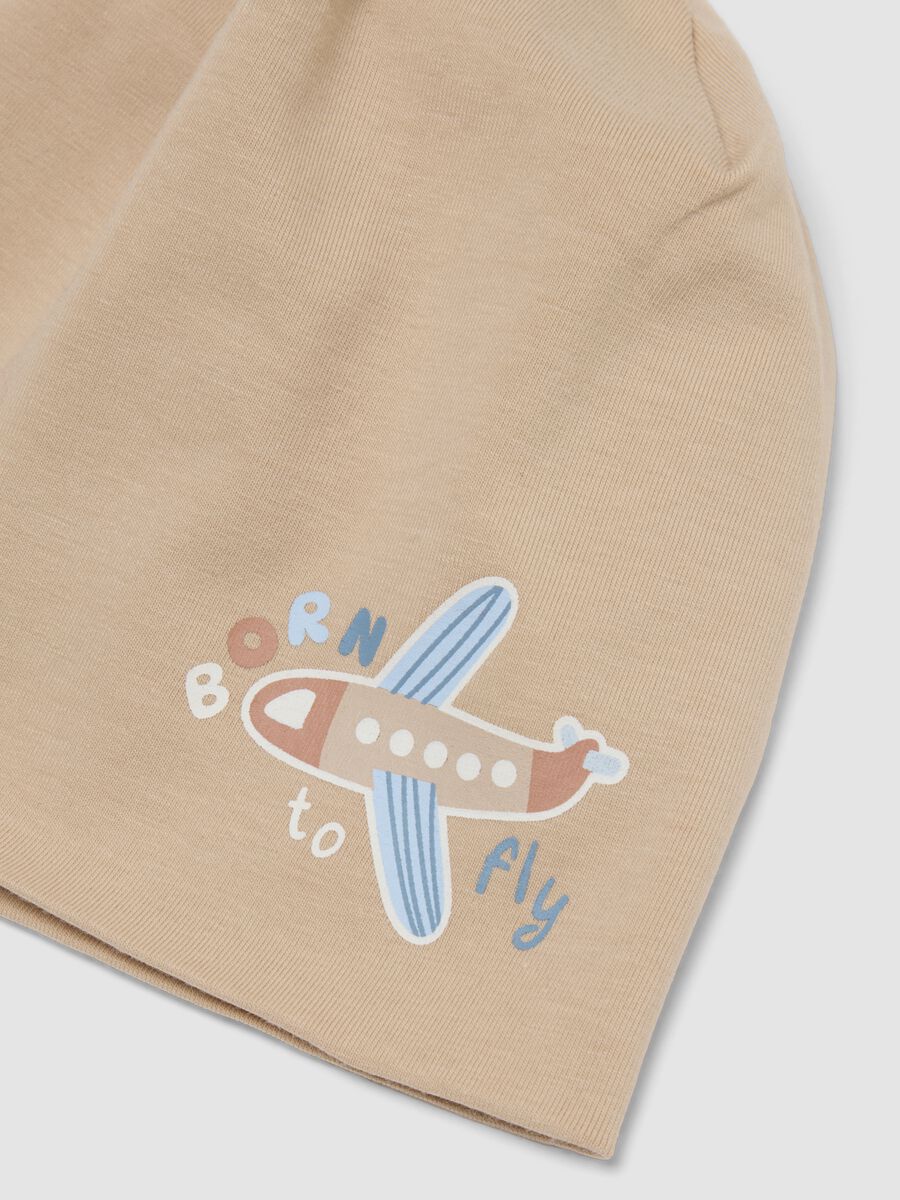 Beige stretch organic cotton baby hat with aeroplane print_1