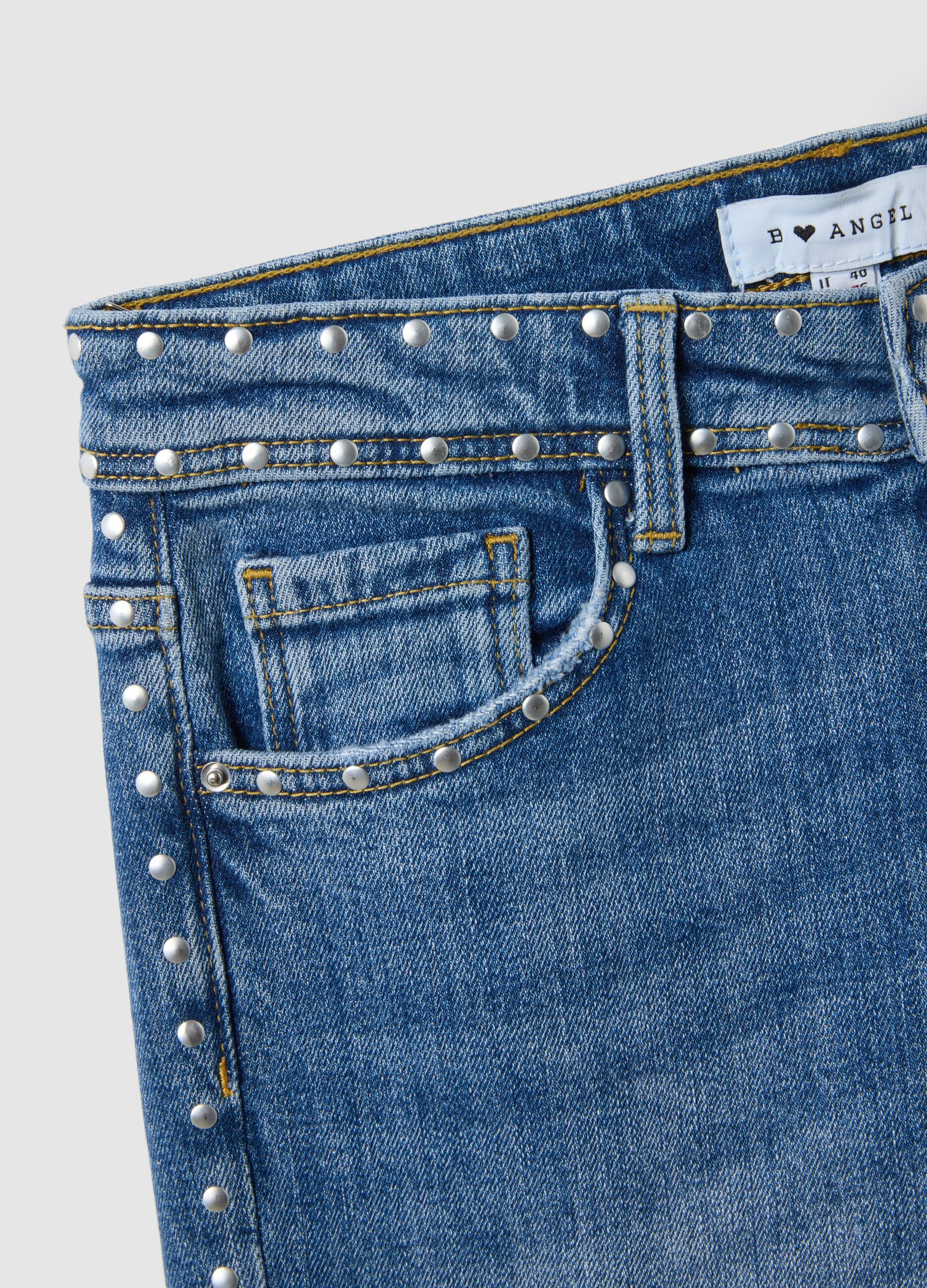 Blue denim bootcut jeans with studs
