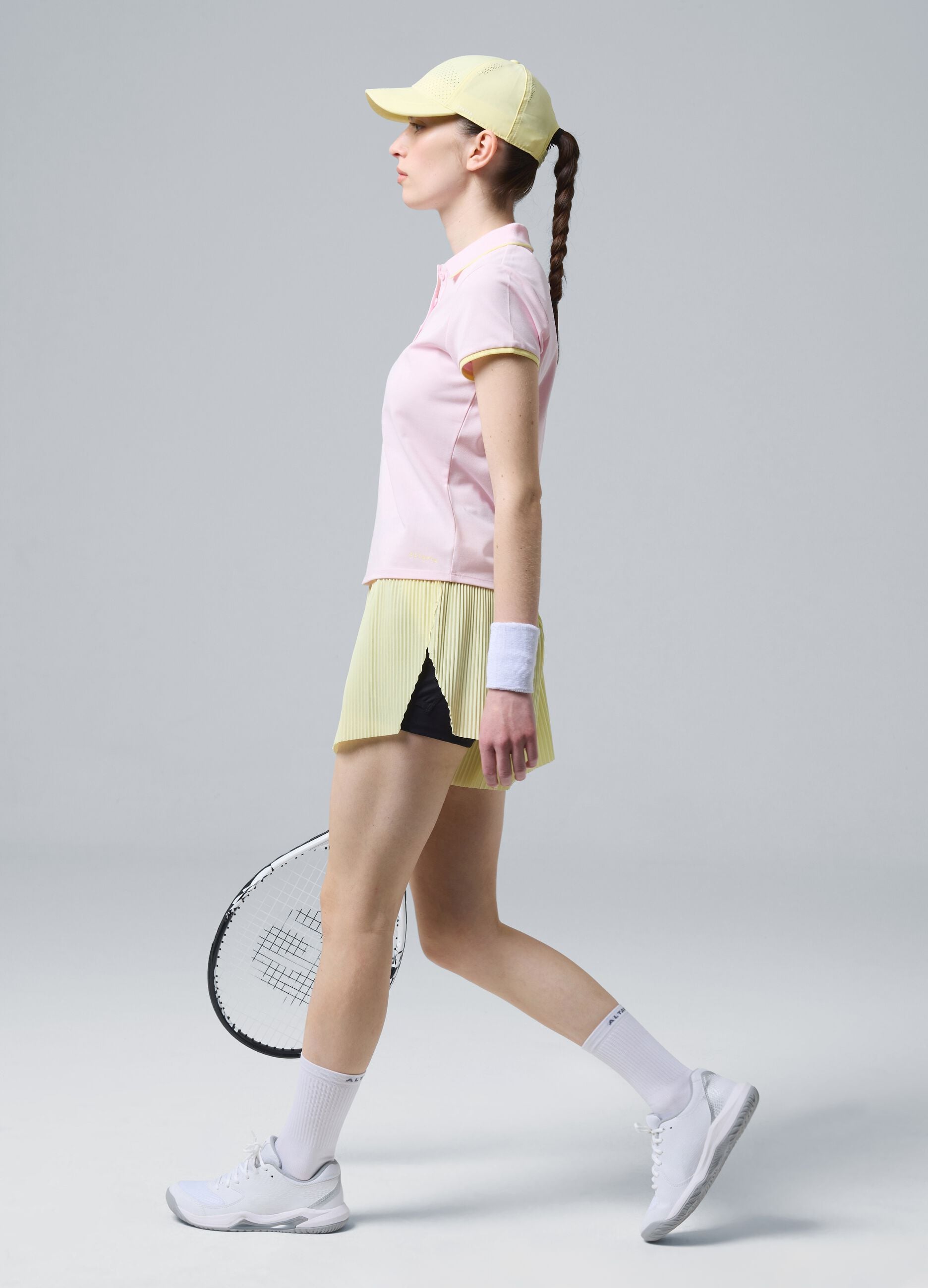 ALTAVIA COURT yellow pleated sports shorts in stretch fabric with removable inner short