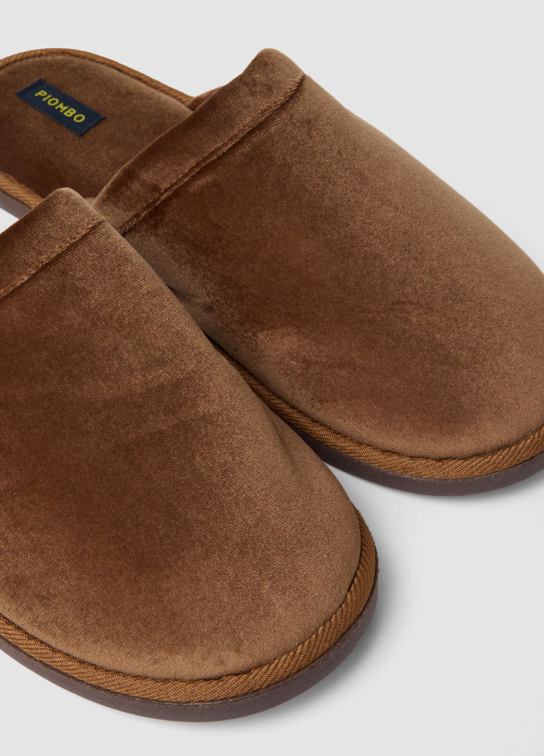 Brown slip-on house slippers with full lining