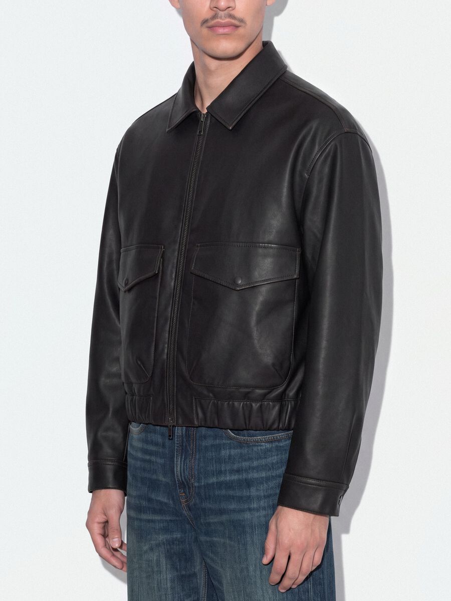 Giubbotto nero crop con zip e tasche con pattina over fit_3