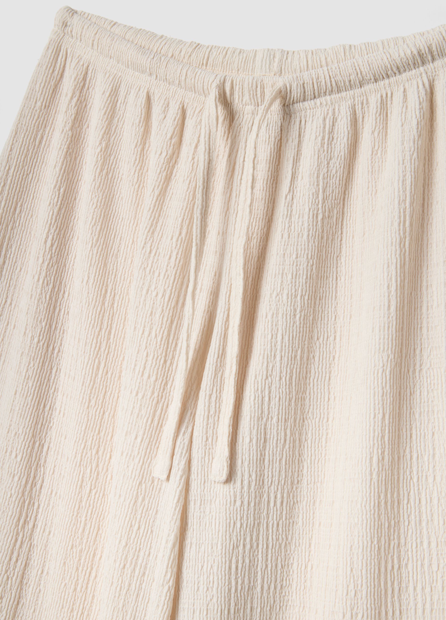 Beige wide leg jogger trousers