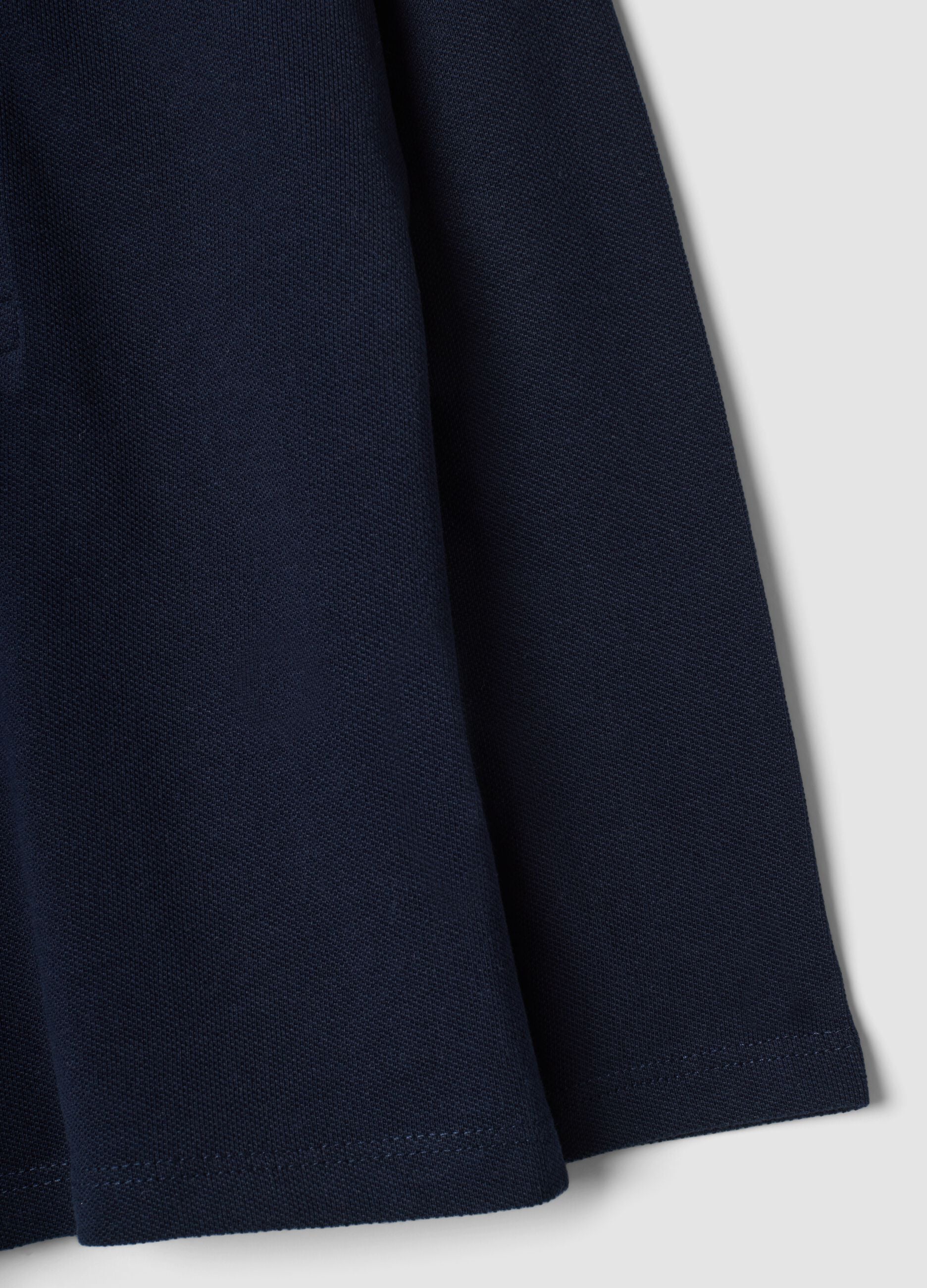 Polo blu a maniche lunghe in cotone organico
