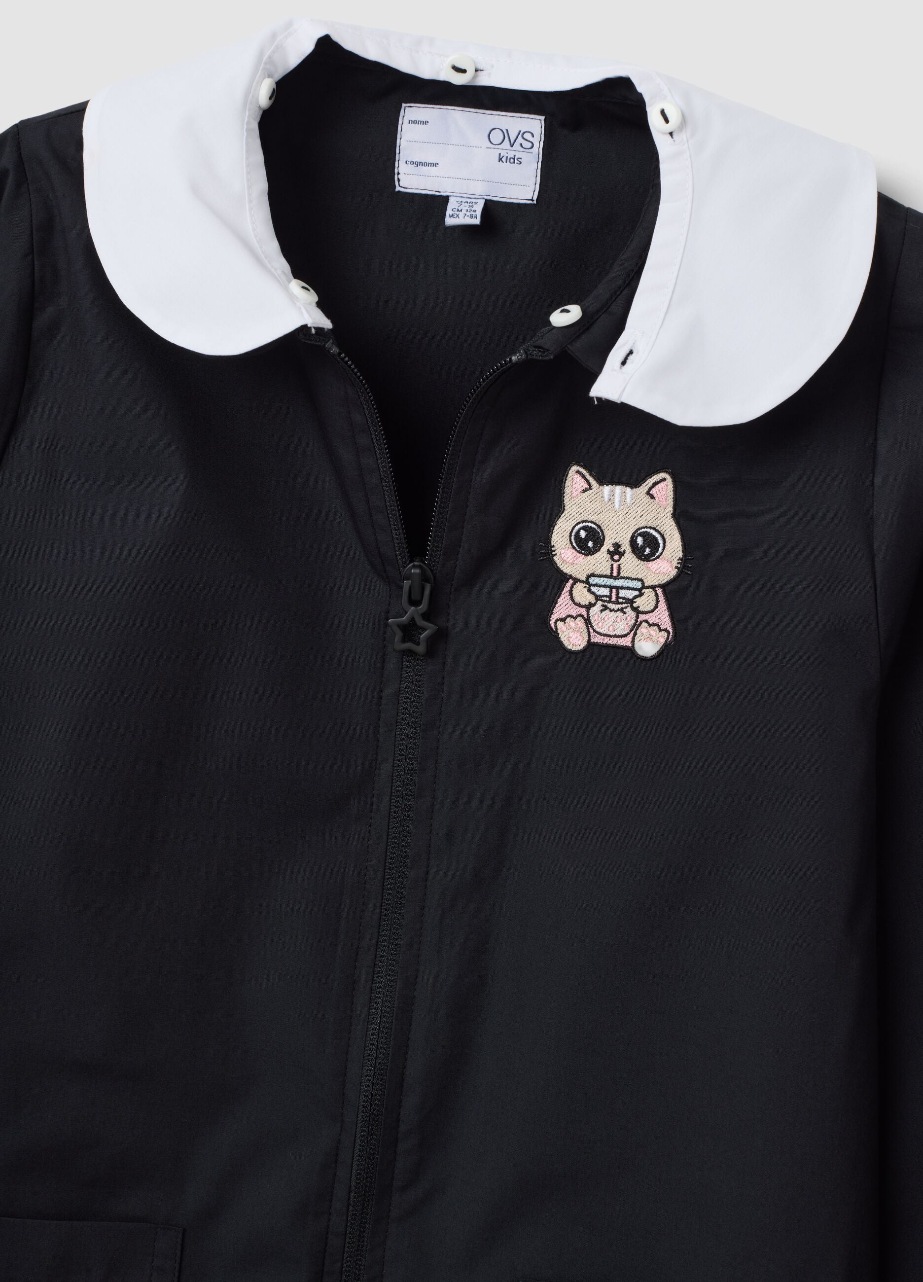 Customisable black school apron for girls with embroidered kitten