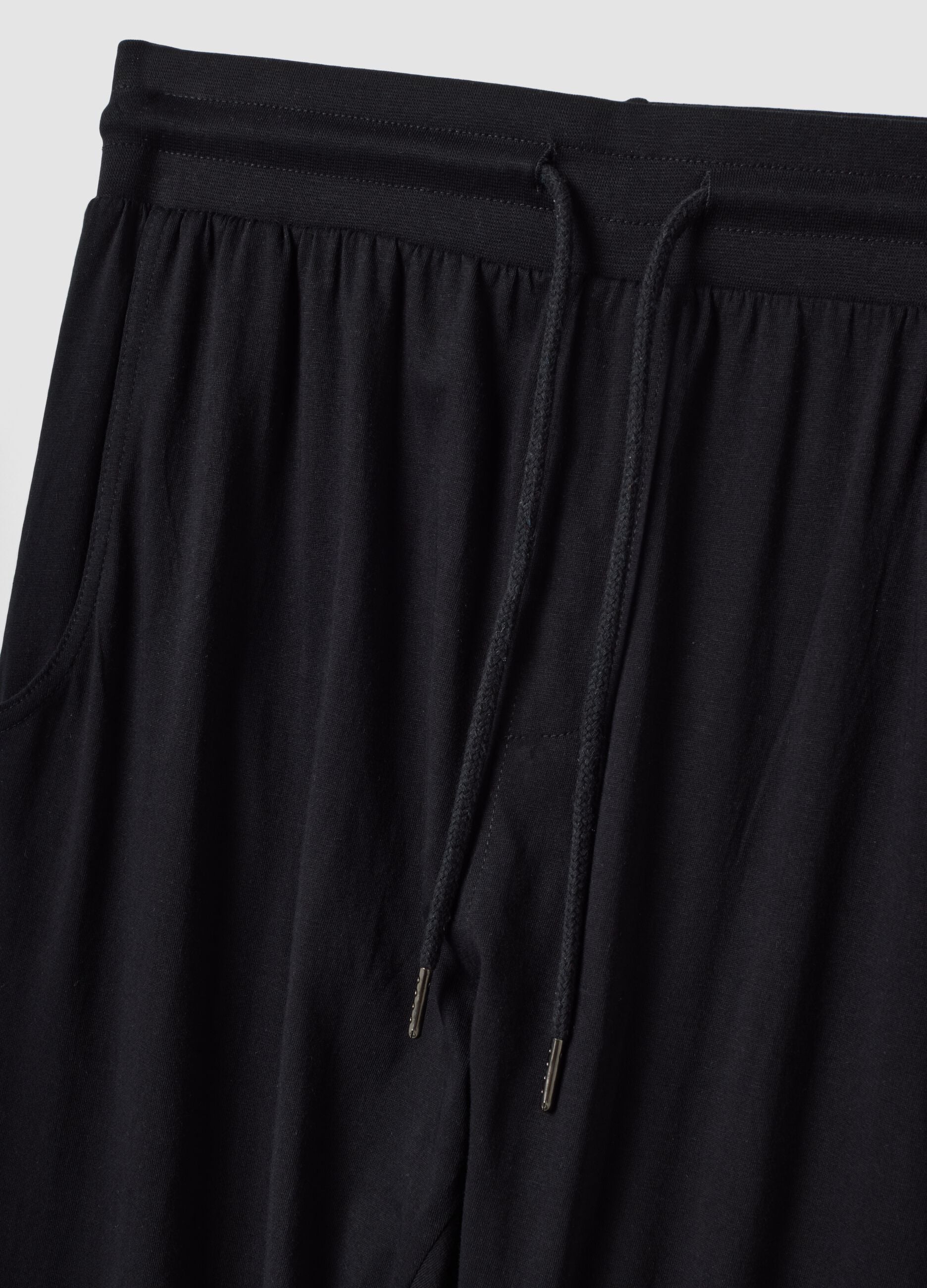 Blue organic cotton pyjama trousers with elasticated waistband