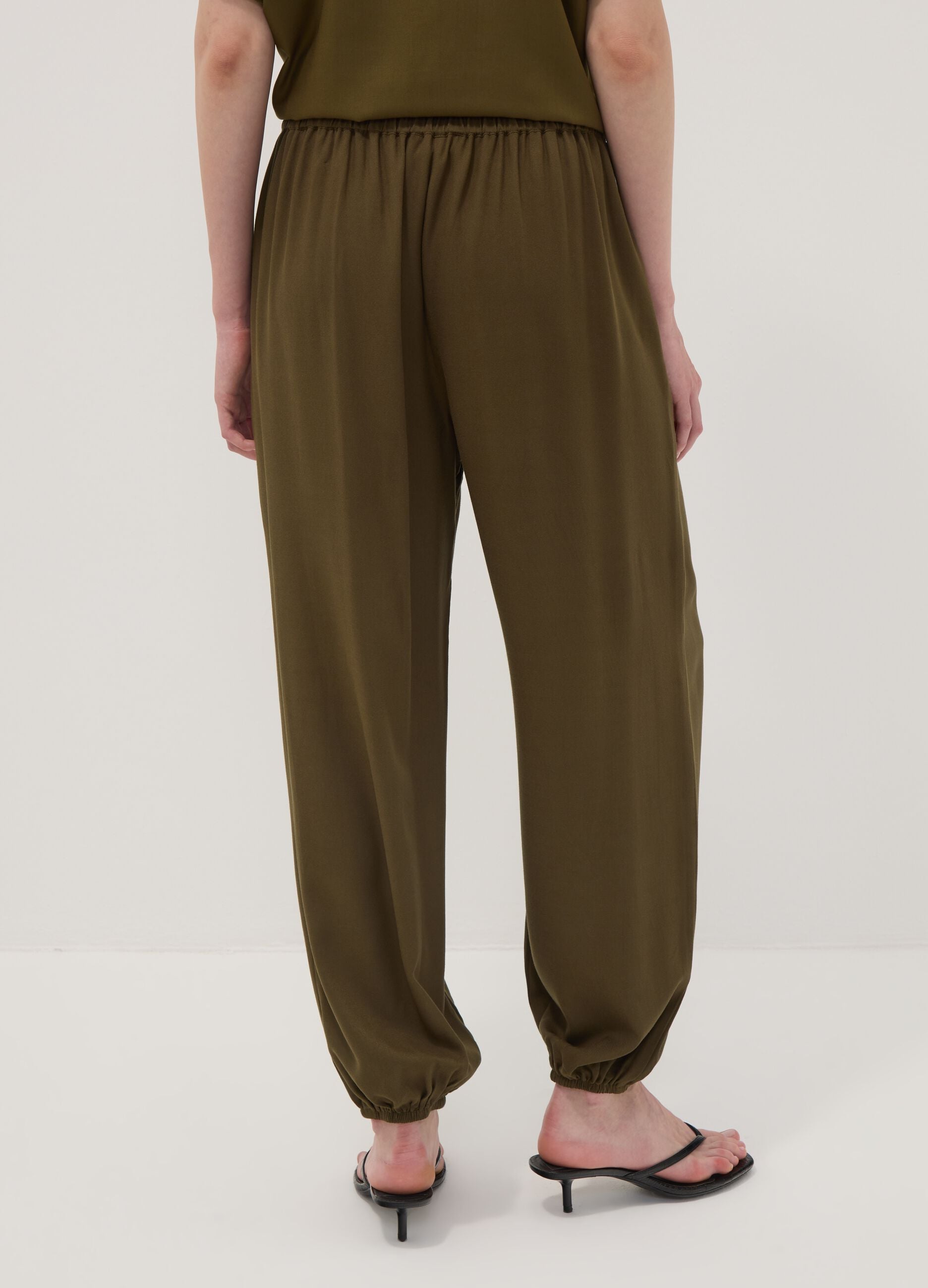 Green pure viscose trousers with elasticated cuffs, regular fit