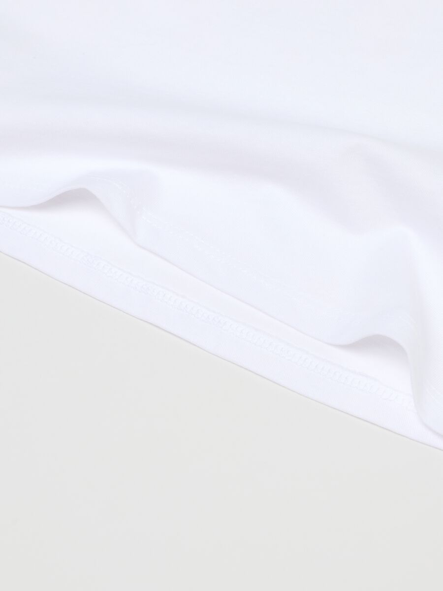 Pack of white girl's vests in pure cotton regular fit_2