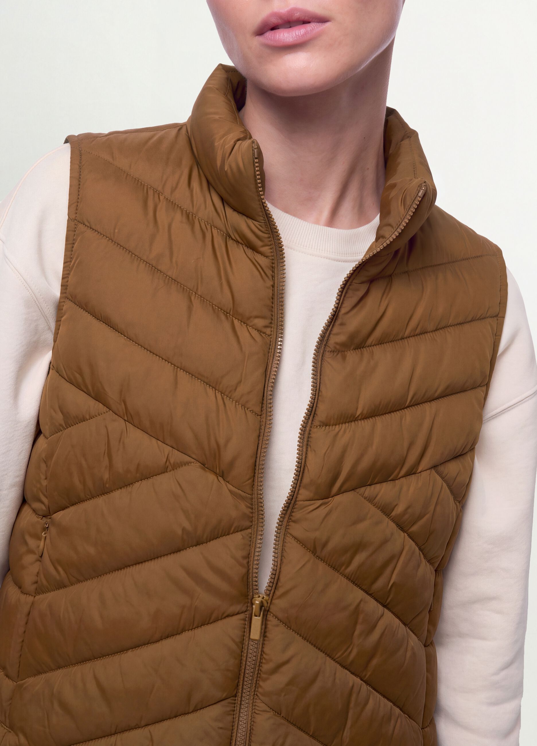 Yellow ultralight quilted gilet with zip and high neck
