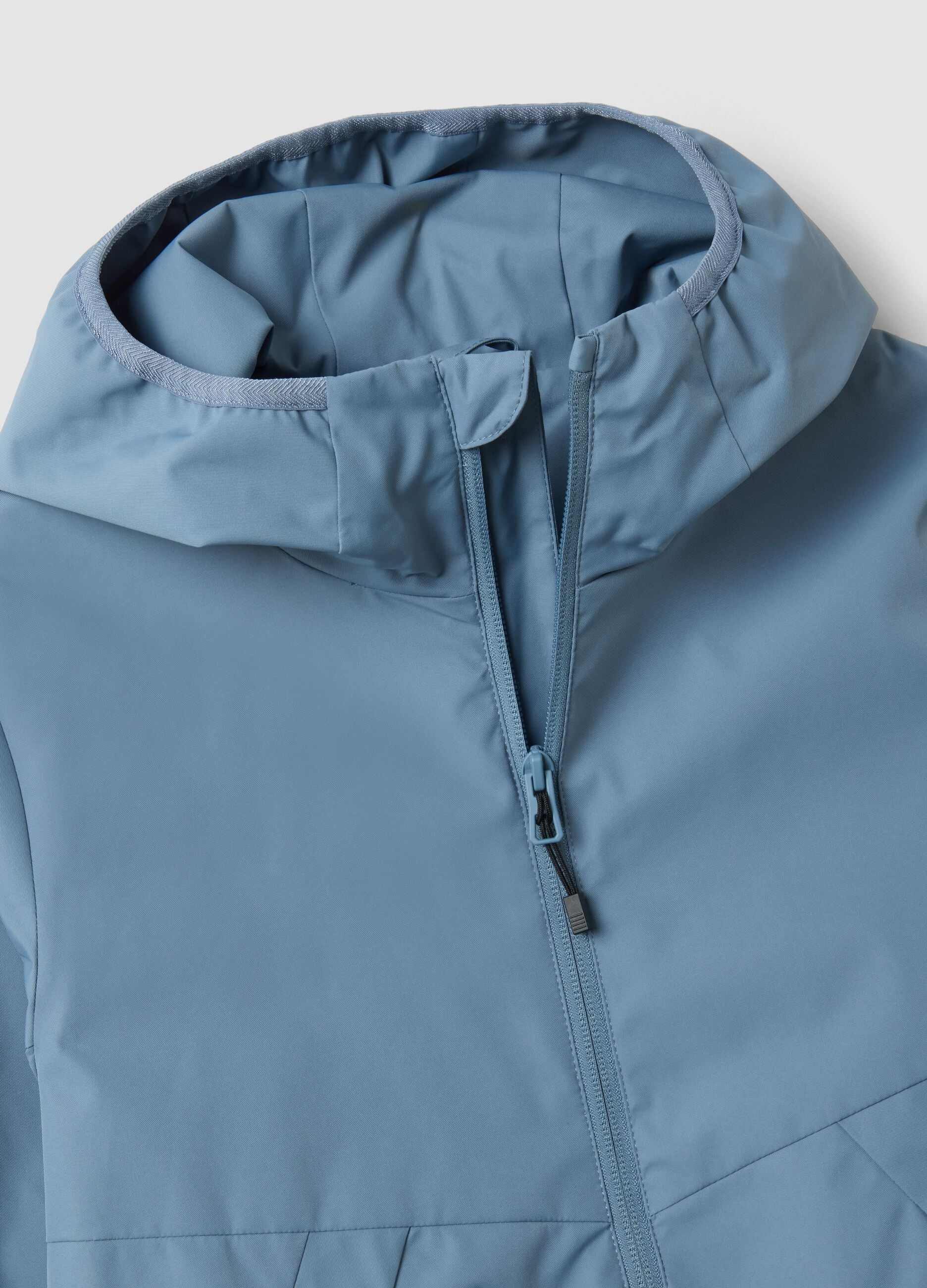 Blue oversized rain jacket with hood and zip for boys