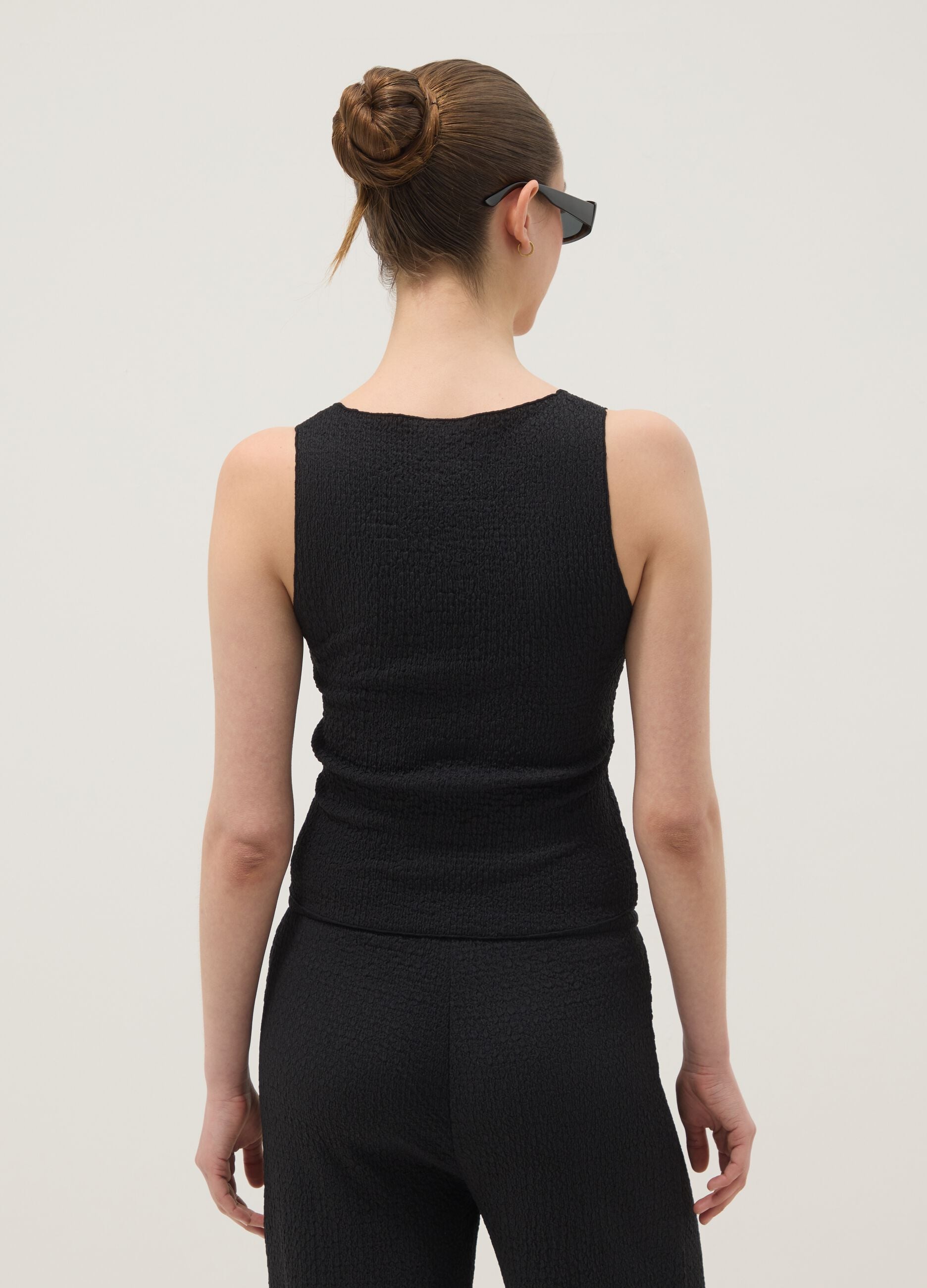 Black stretch tank top with crinkled texture