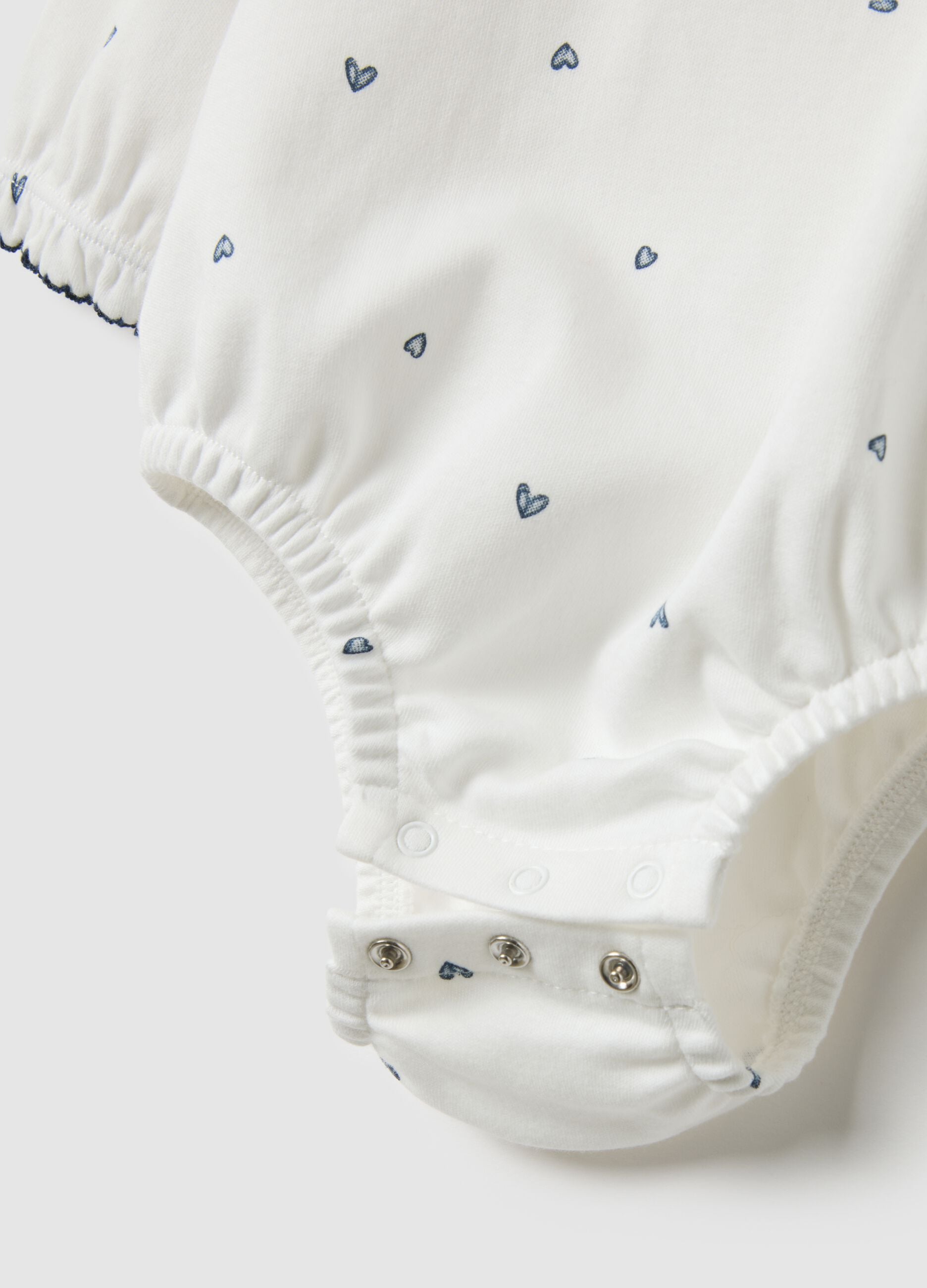 Baby girl white pure cotton bodysuit with ruffle collar and hearts