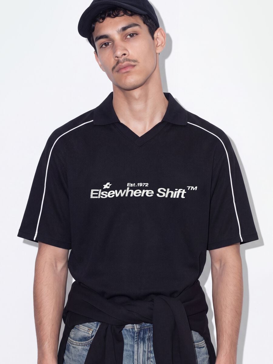 Polo nera in puro cotone over fit a maniche corte over fit_2