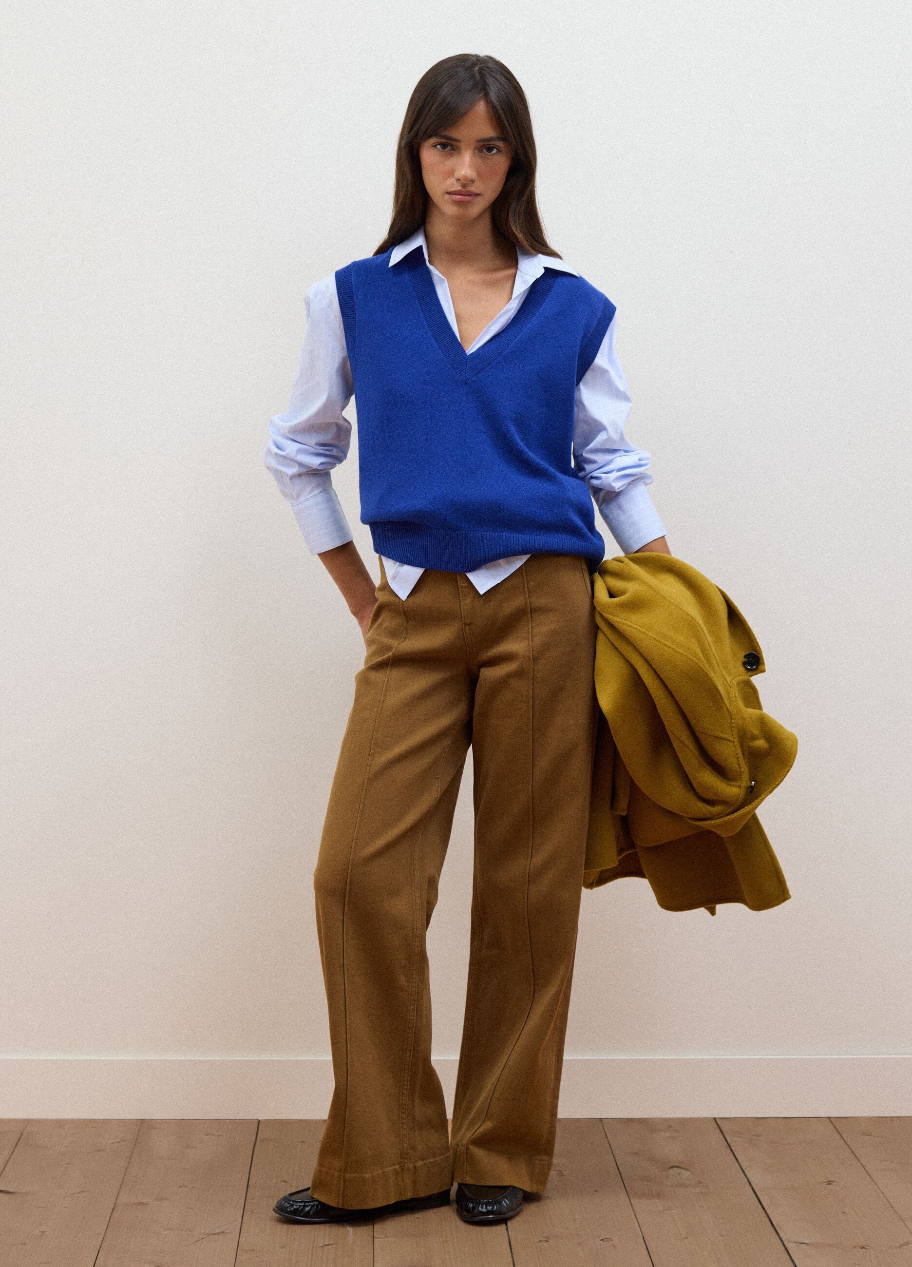 Blue pure wool gilet with deep V-neck