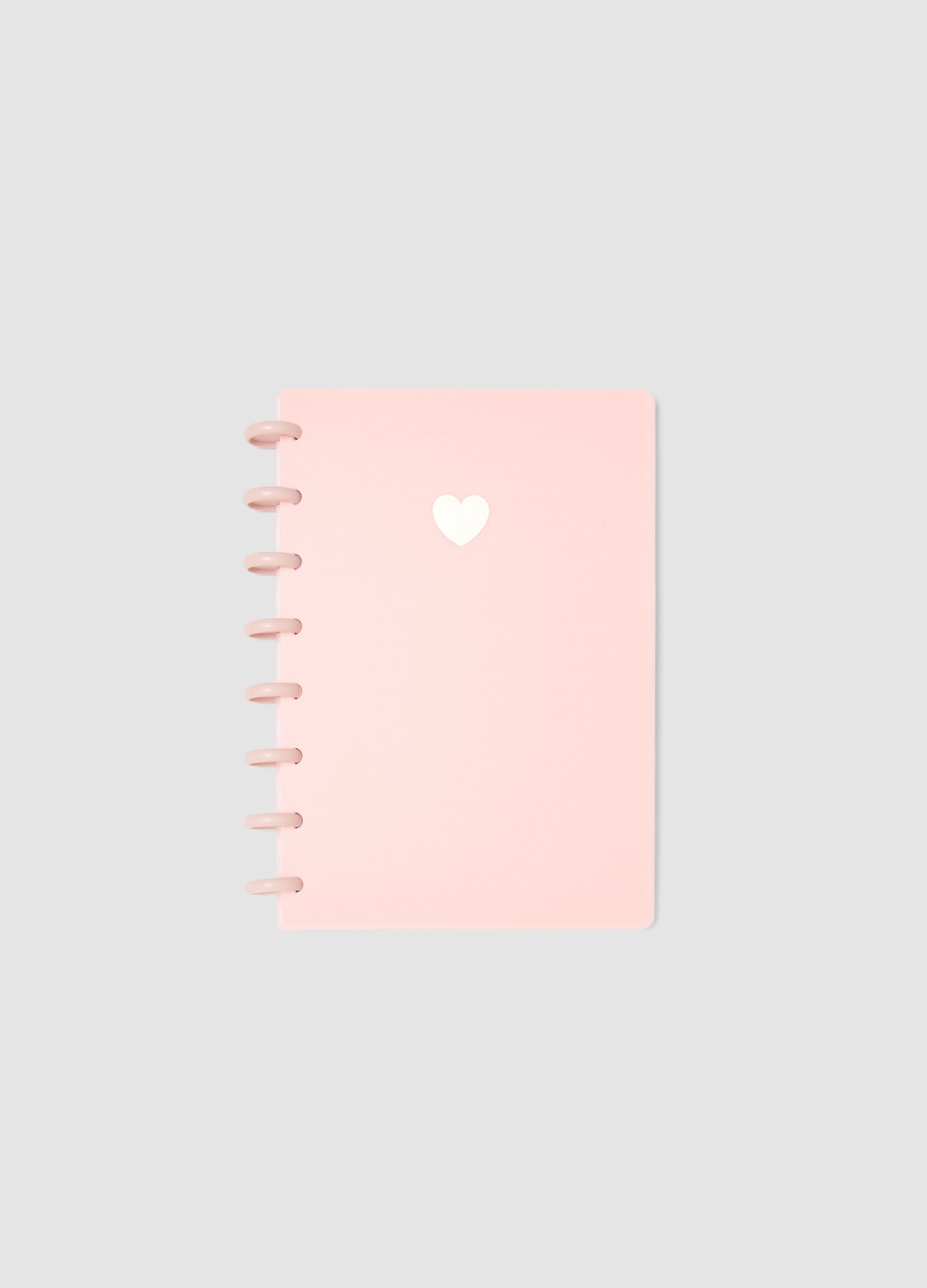 Pink notebook with lined pages in hardback with spiral