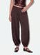 Brown baggy-fit trousers with elasticated hems_1
