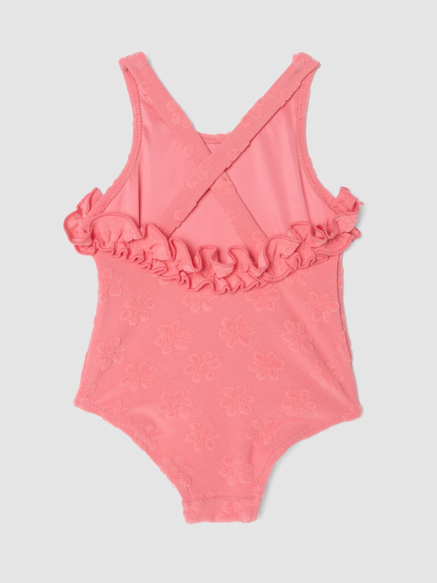 Costume intero rosa in tessuto elasticizzato da neonata con fiori_1