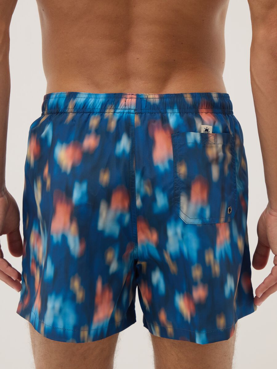Blue boxer swim shorts with multicolour gradient print_2