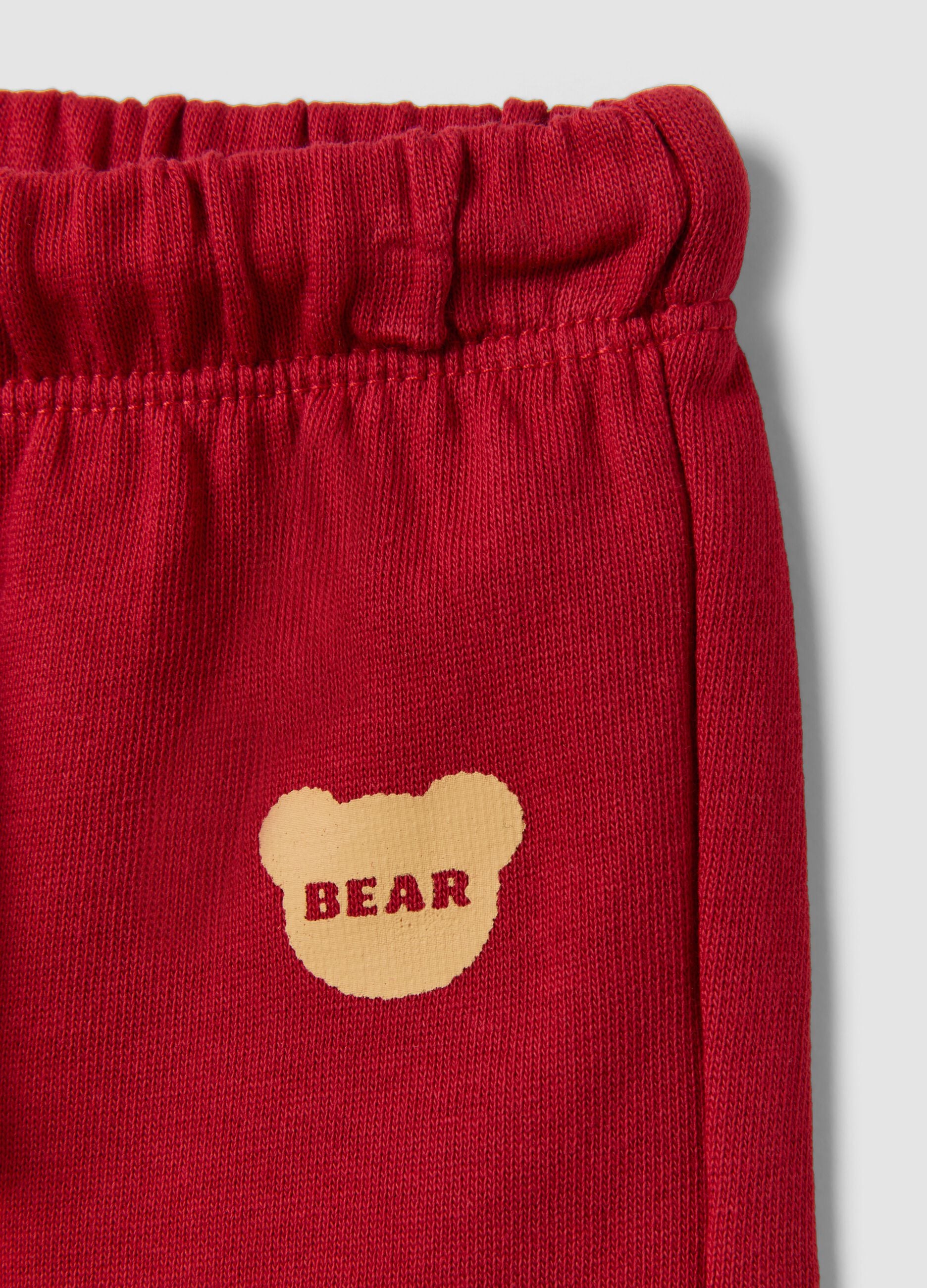 Red pure cotton trousers with elasticated waist and print for baby girls