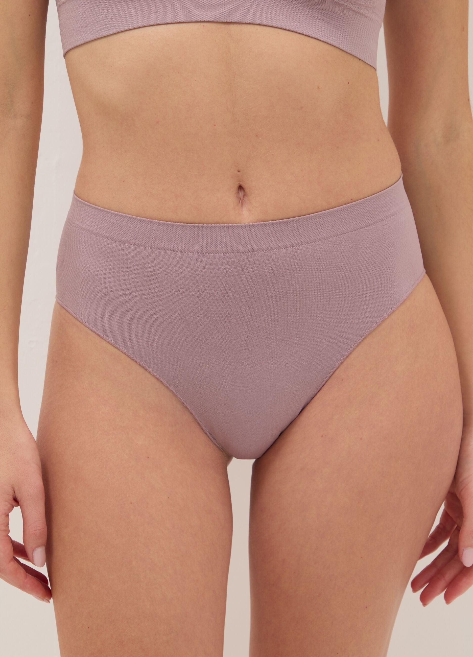 High-waisted pink stretchy fabric brief