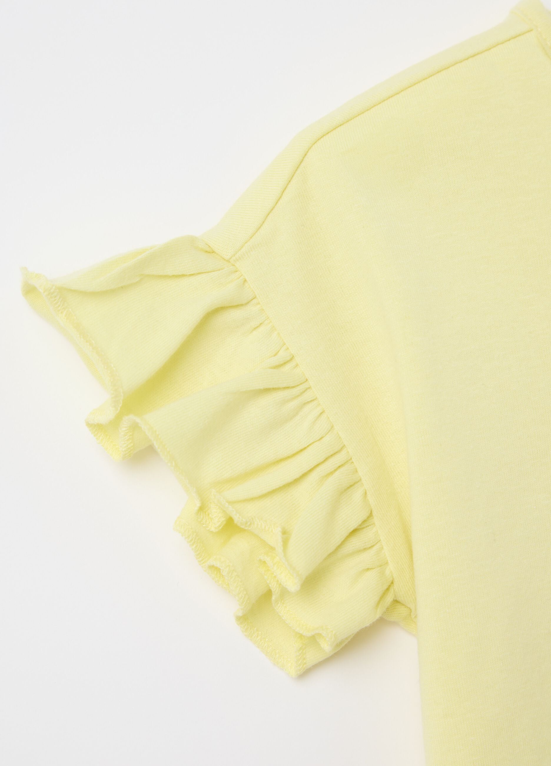 Yellow T-shirt in cotton with print and flounce