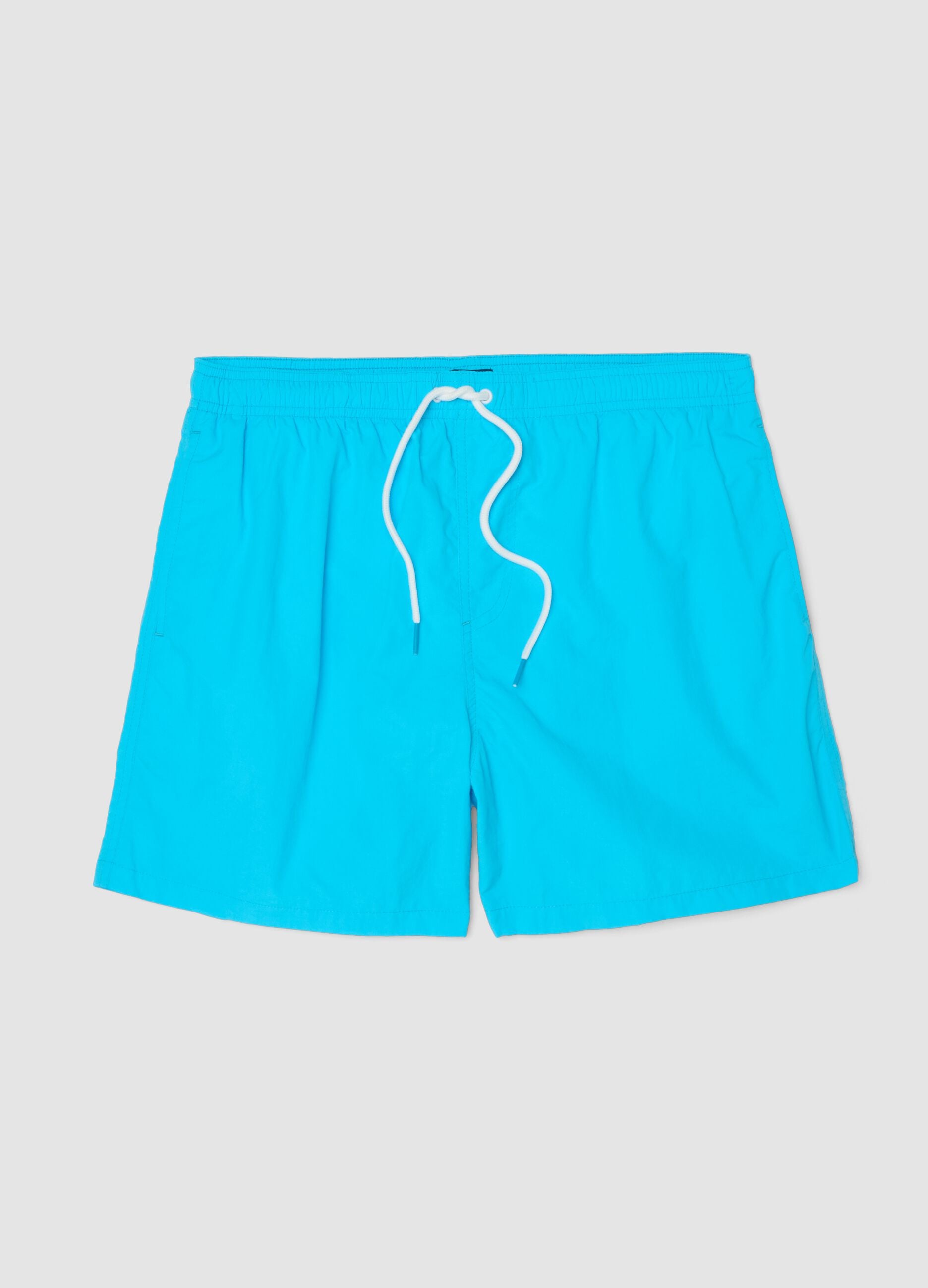 Blue swim shorts with elasticated waist