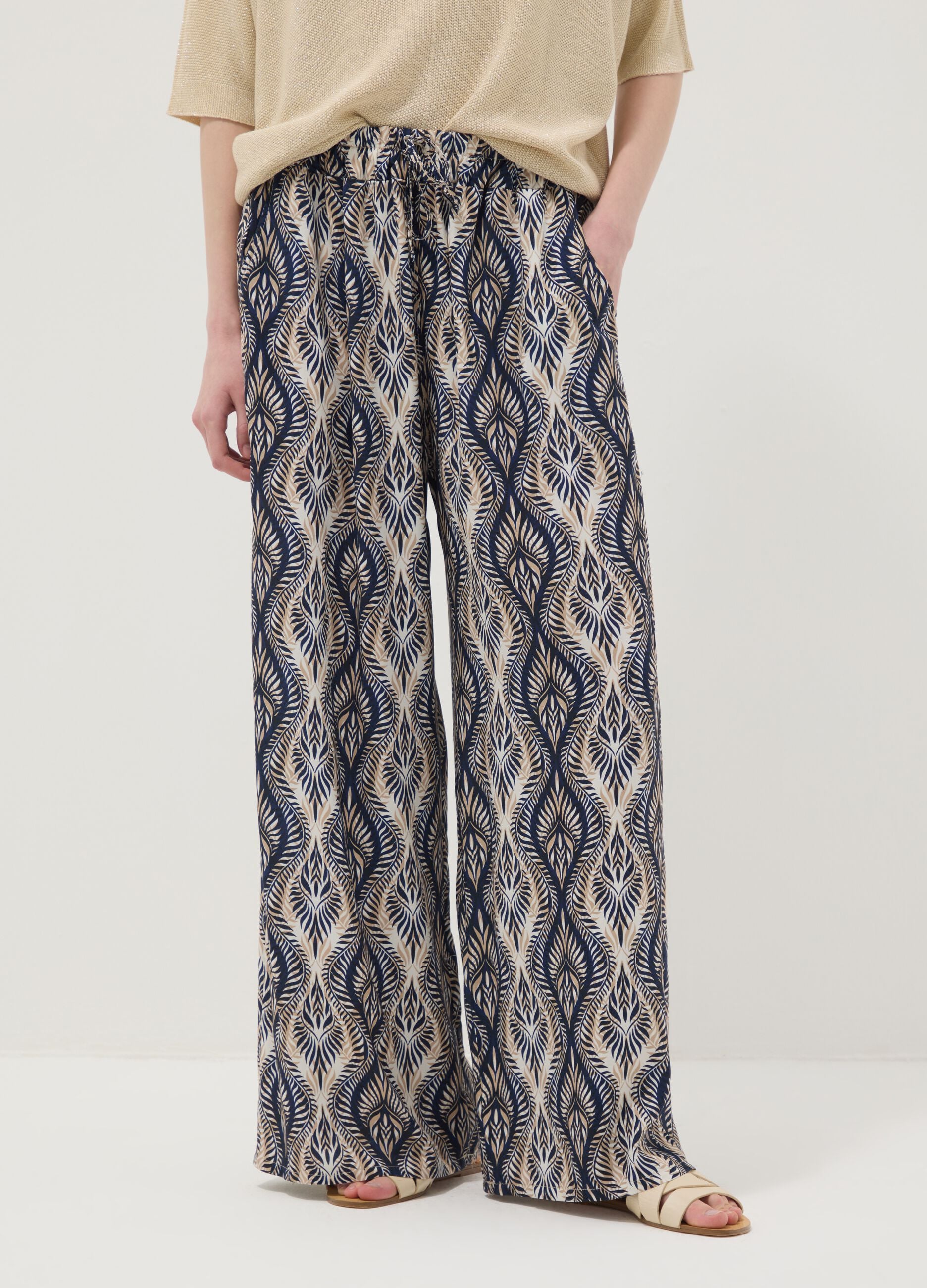 Blue pure-viscose trousers with all-over print, regular fit