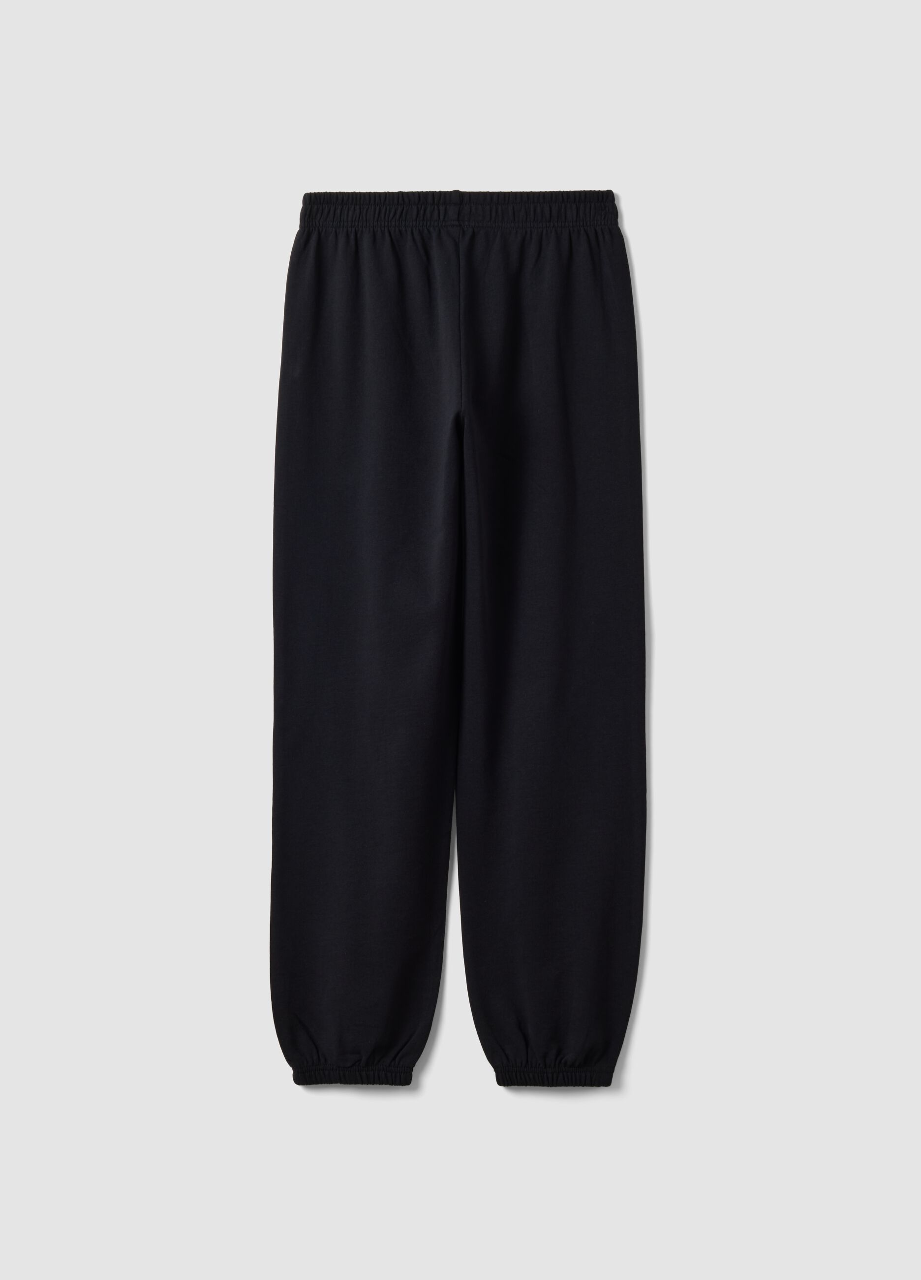 Black jogger trousers in organic cotton and viscose blend for girls