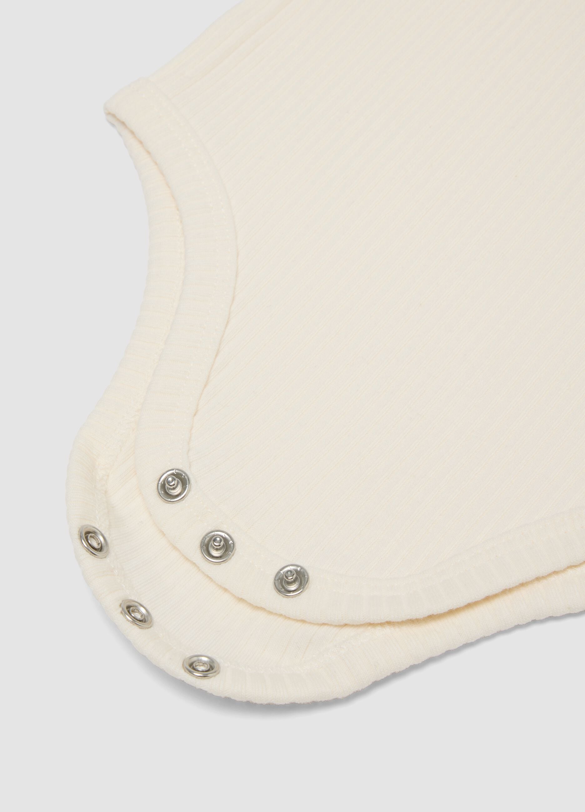 White ribbed organic cotton Disney 101 Dalmatians baby bodysuit