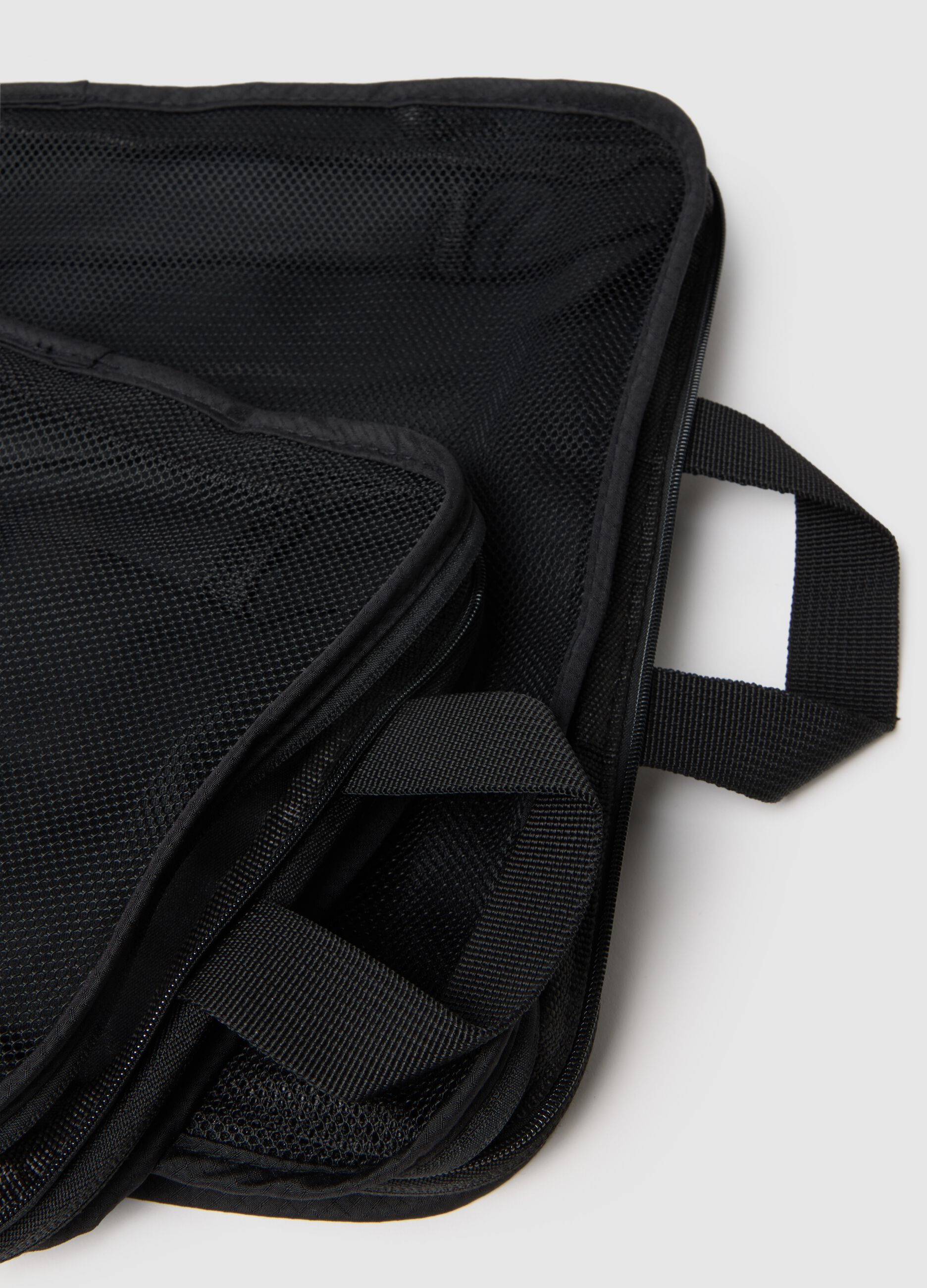 Black utility shoulder bag with a compact design