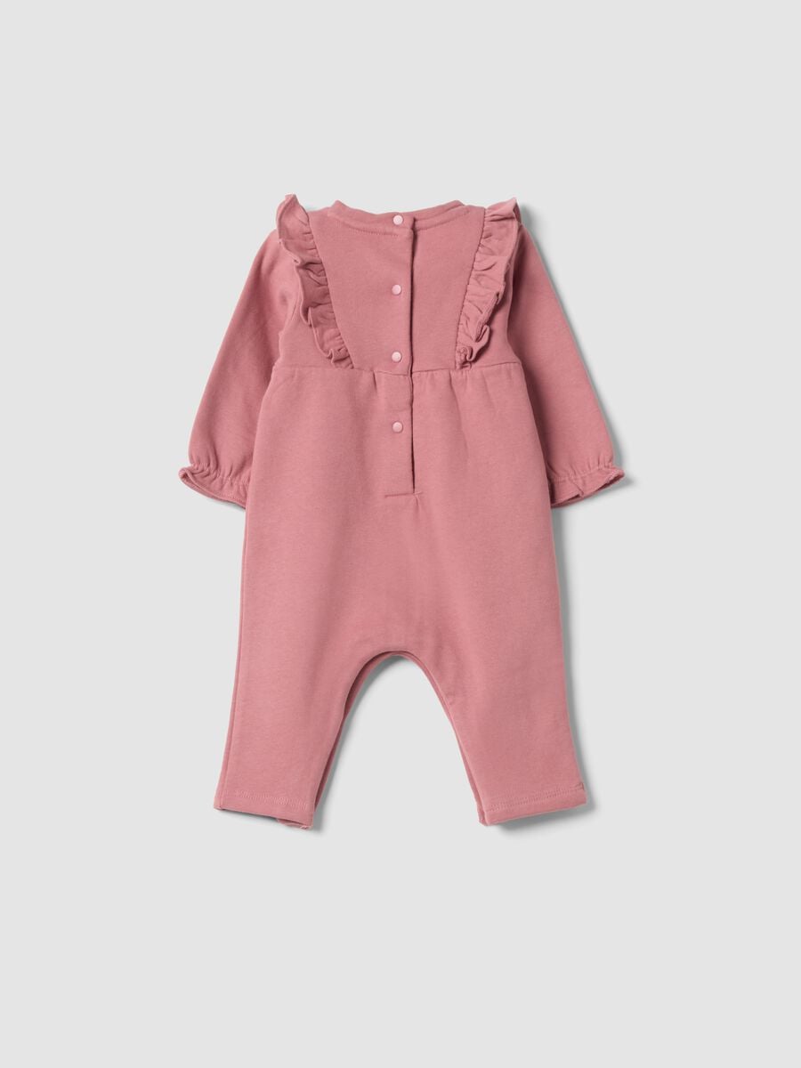 Pink organic cotton sleepsuit with ruffles and chest embroidery_1