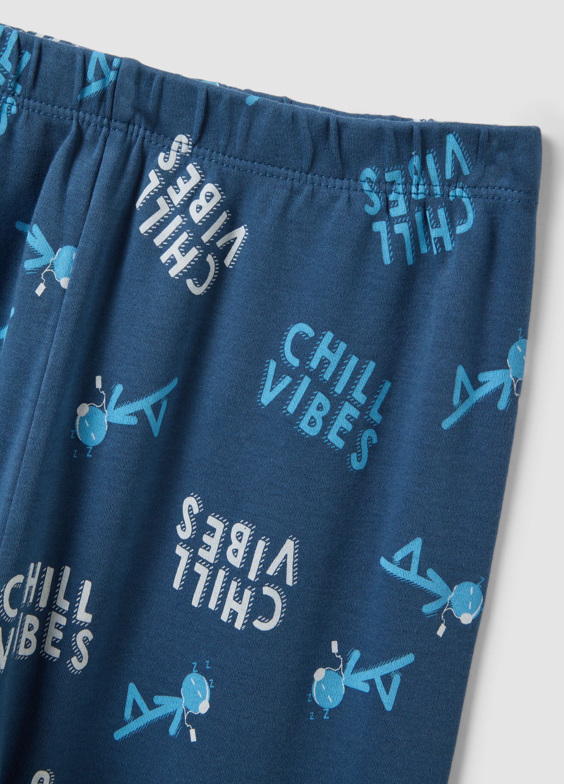 Blue organic cotton pyjamas with "Chill Vibes" slogan for boys