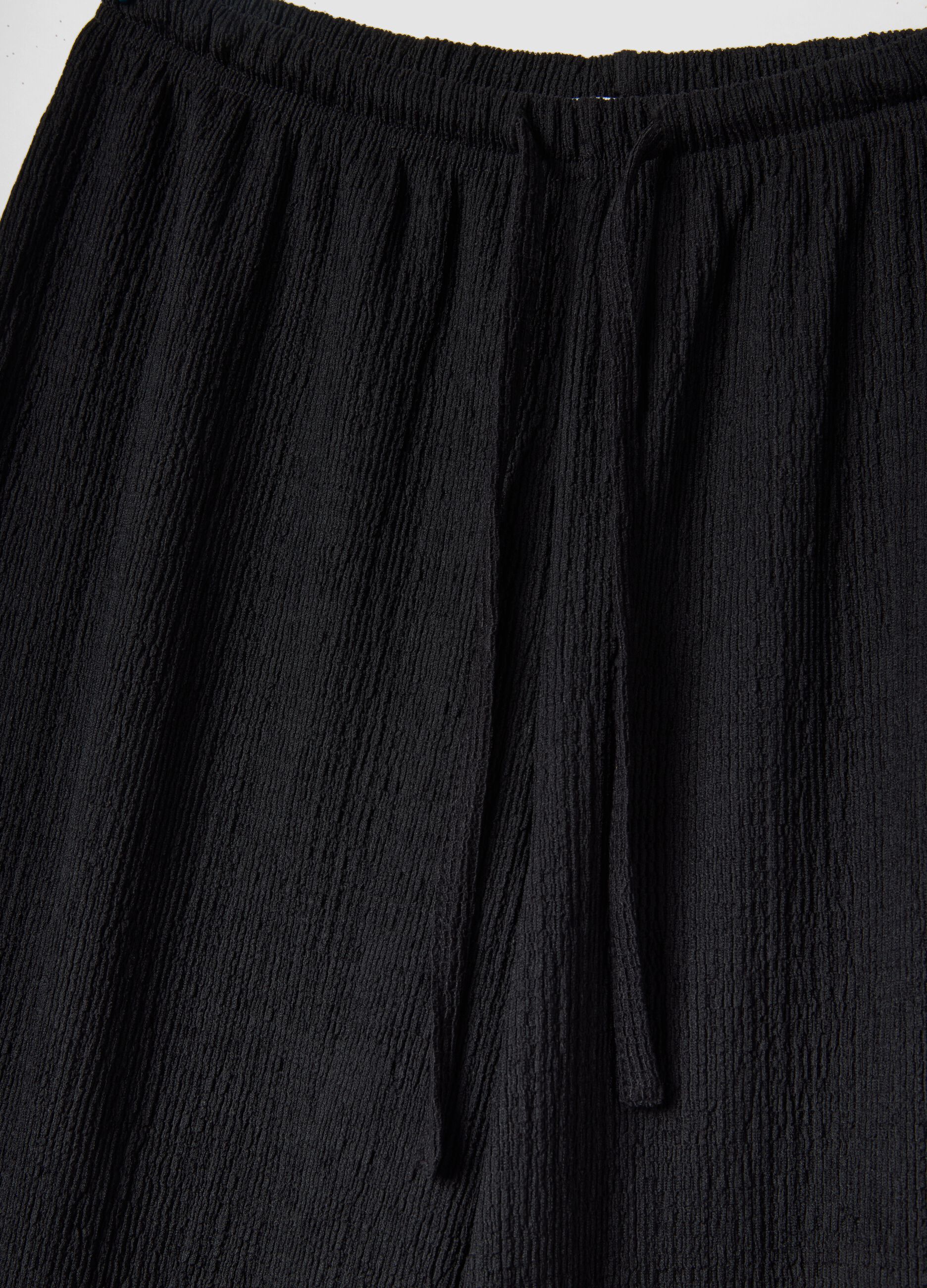 Black wide-leg jogger trousers