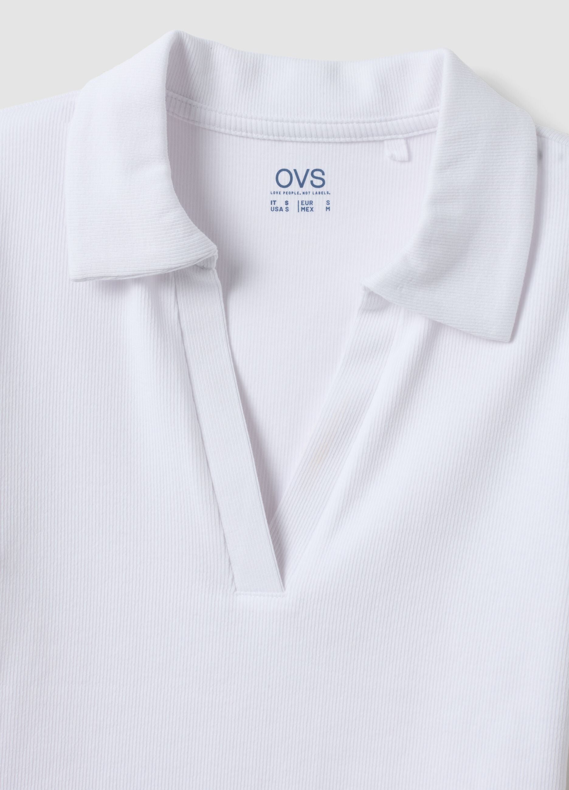 White stretch cotton polo shirt with open V-neck, regular fit