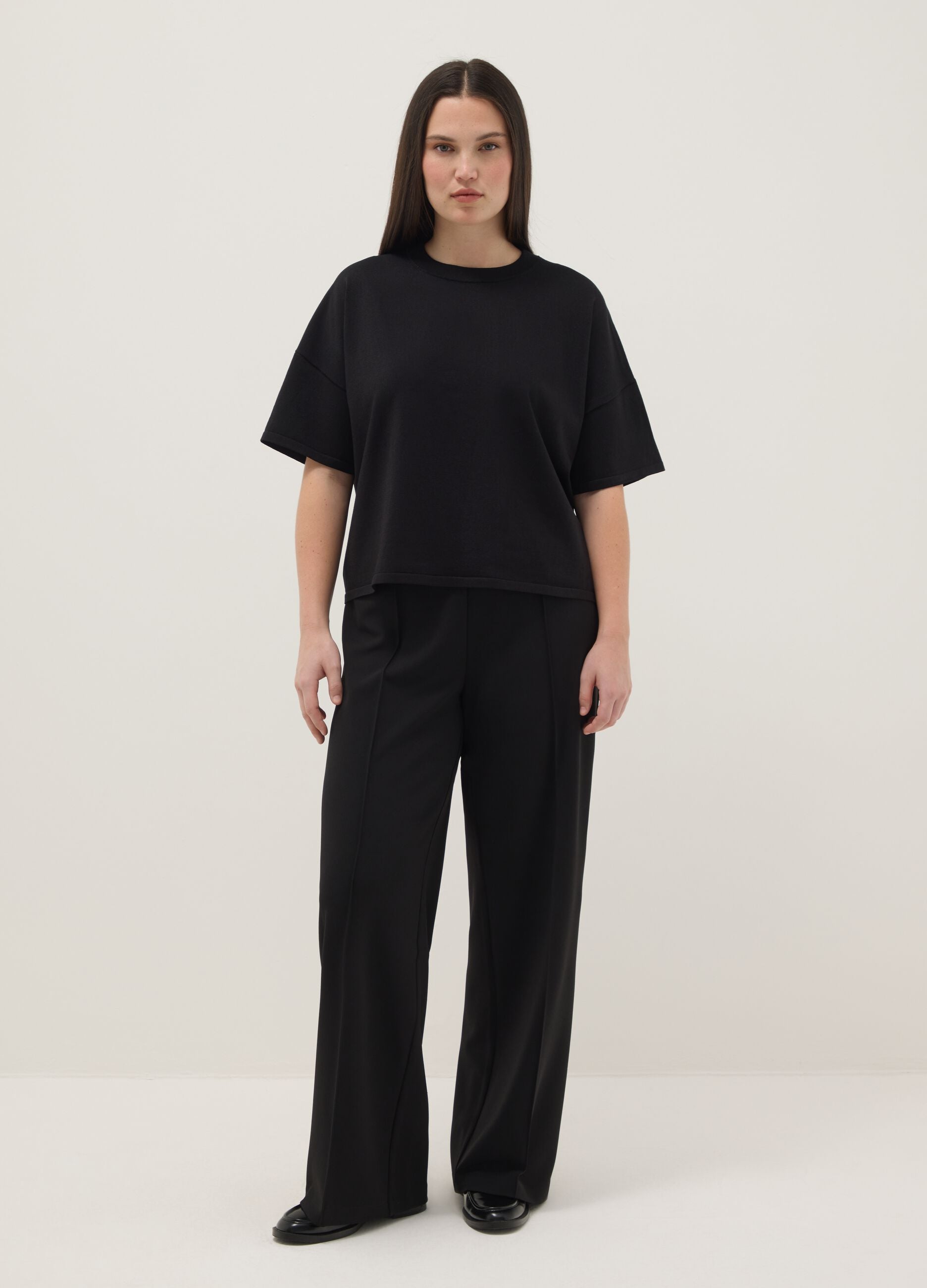 Black oversized crop top with round neckline