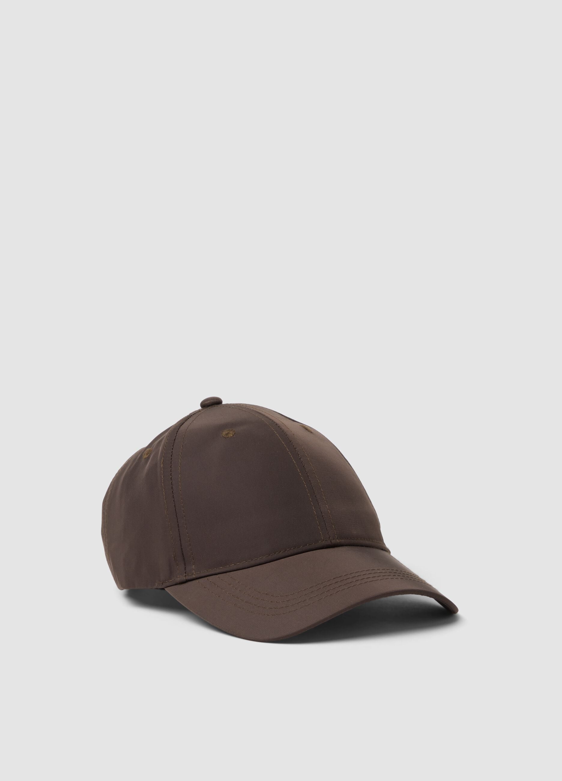 Brown cap with curved peak