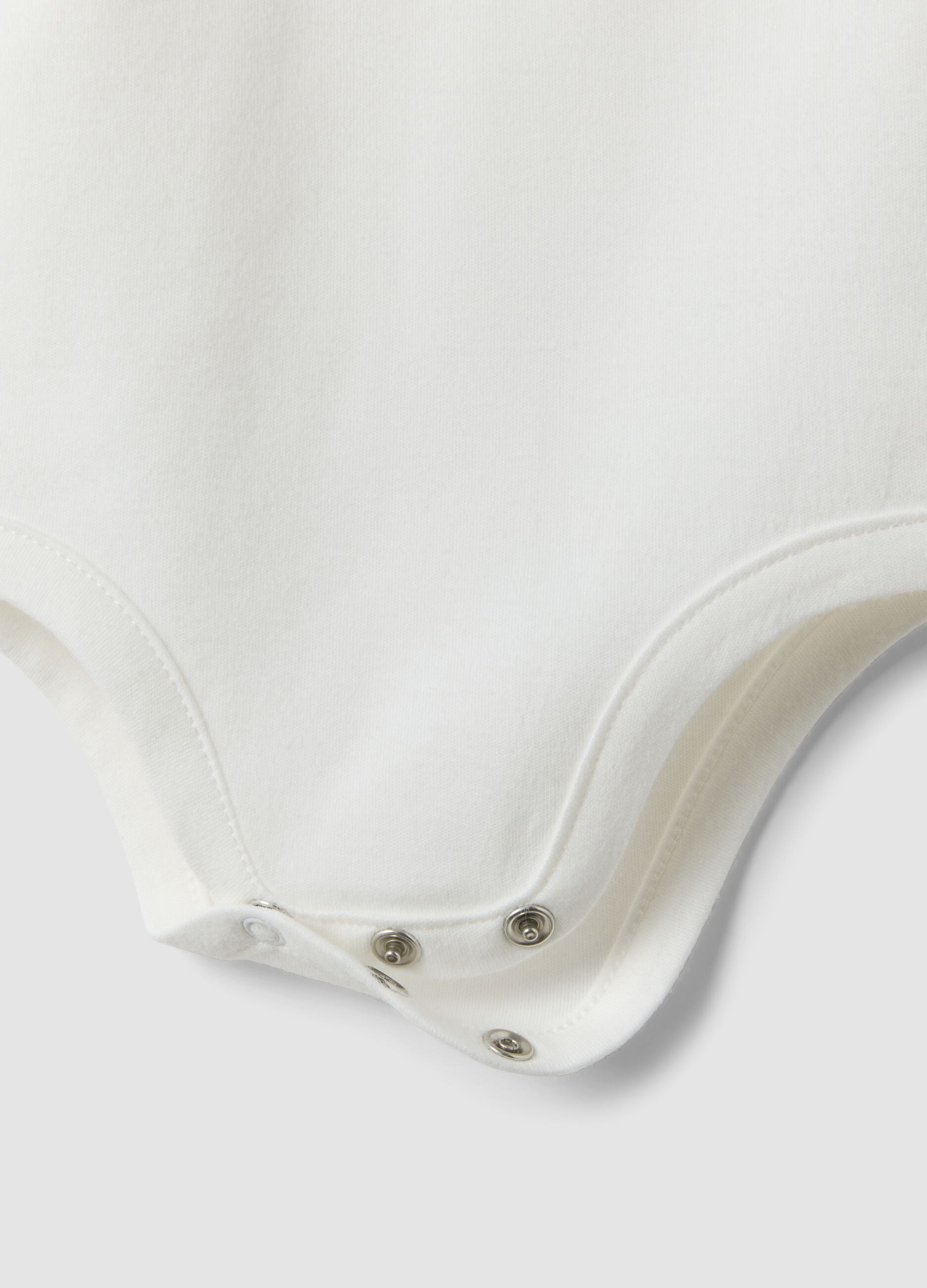 White organic cotton baby bodysuit with collar