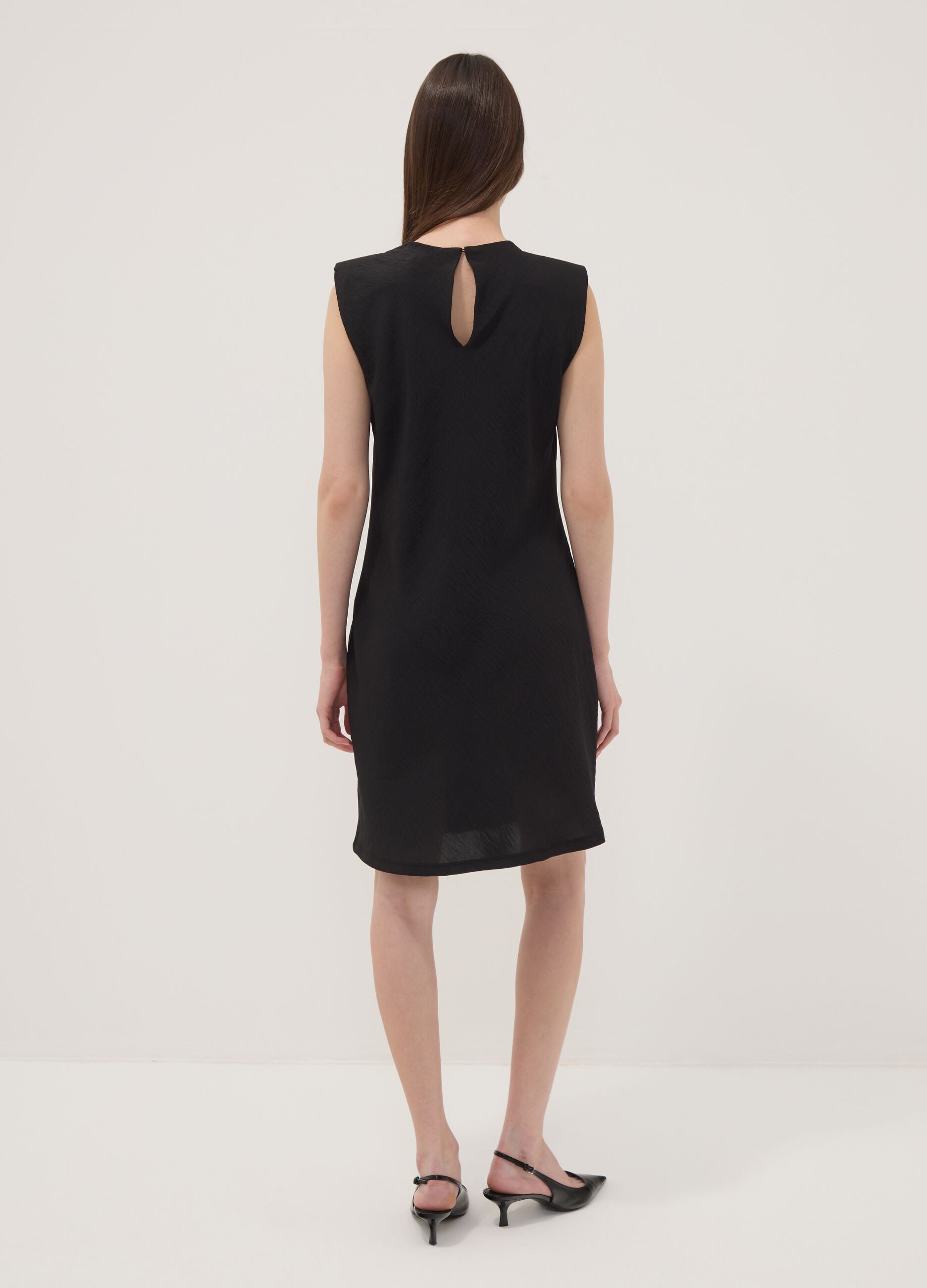 Black fitted dress with ruched detailing