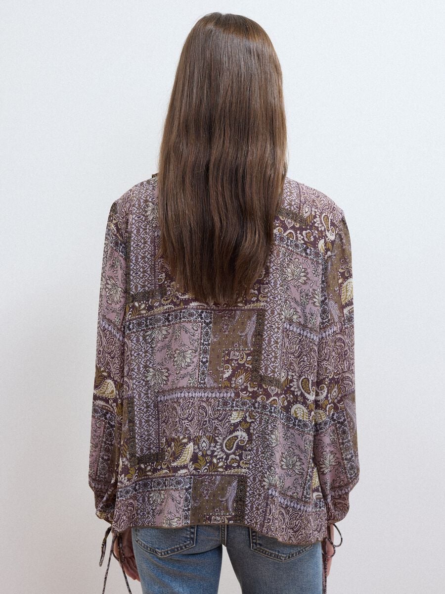 Purple patterned blouse with ruffles and tie neck_3