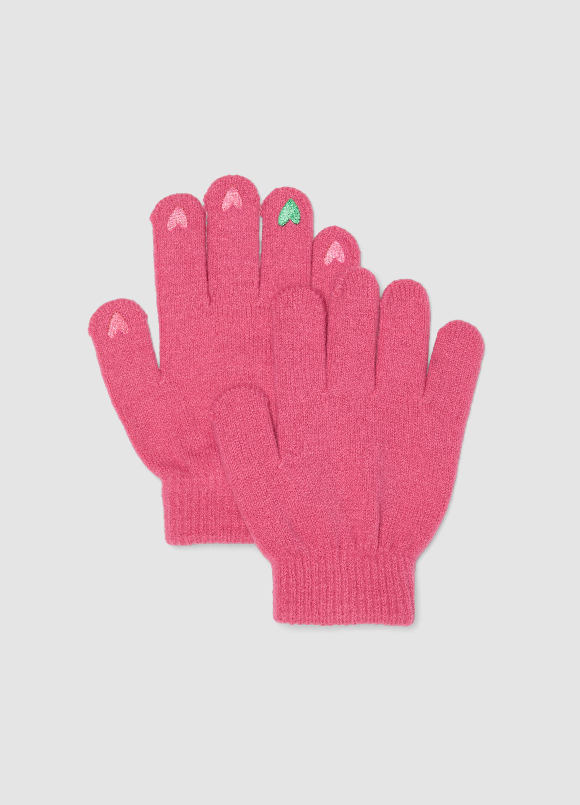 Pink knitted gloves with hearts