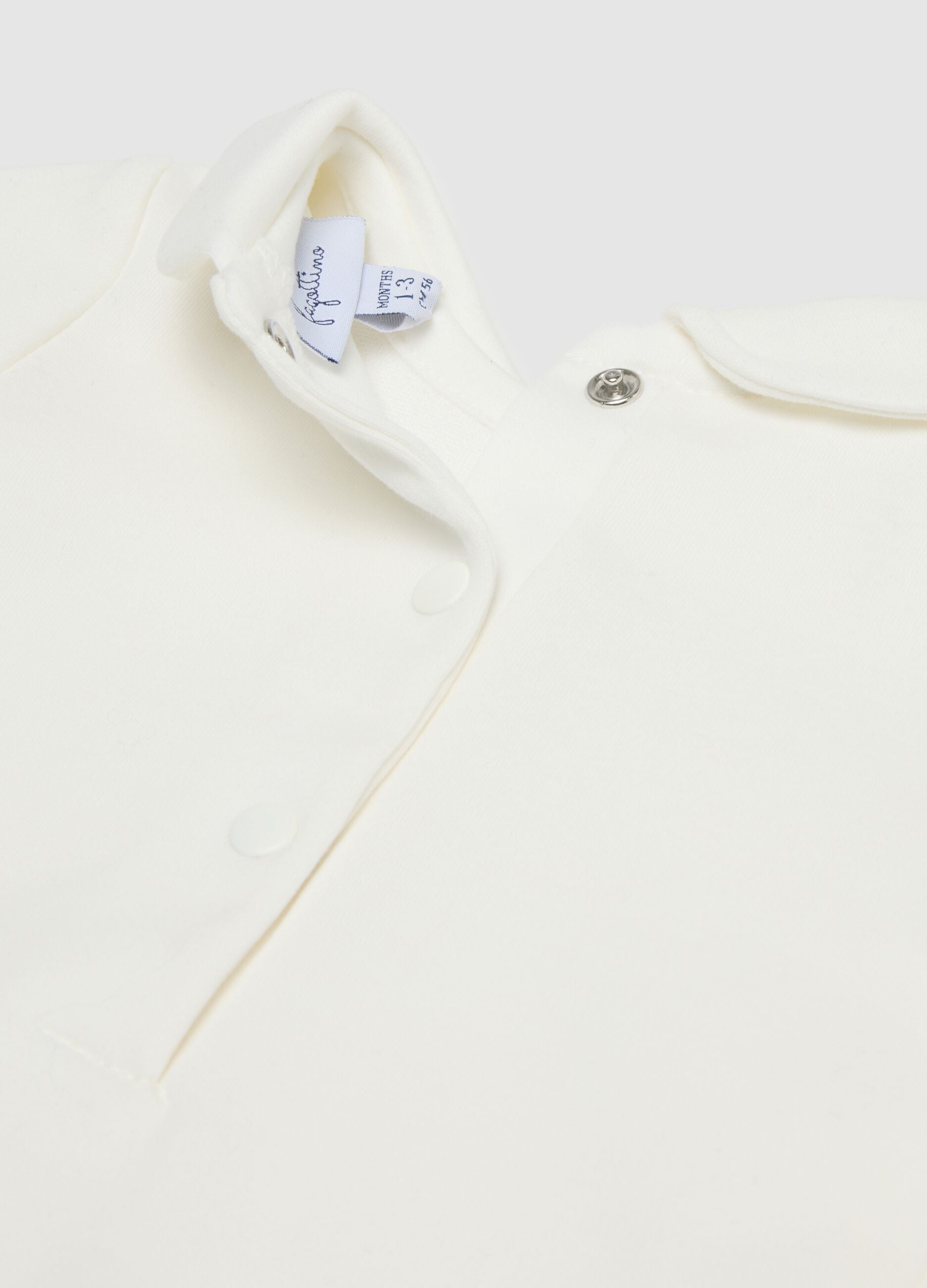 White baby girl's bodysuit in pure cotton with collar and embroidery