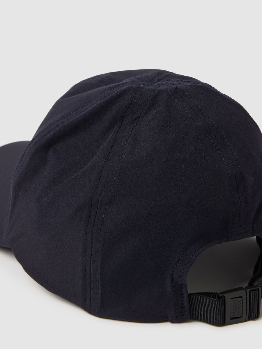 Blue cap with adjustable visor_1