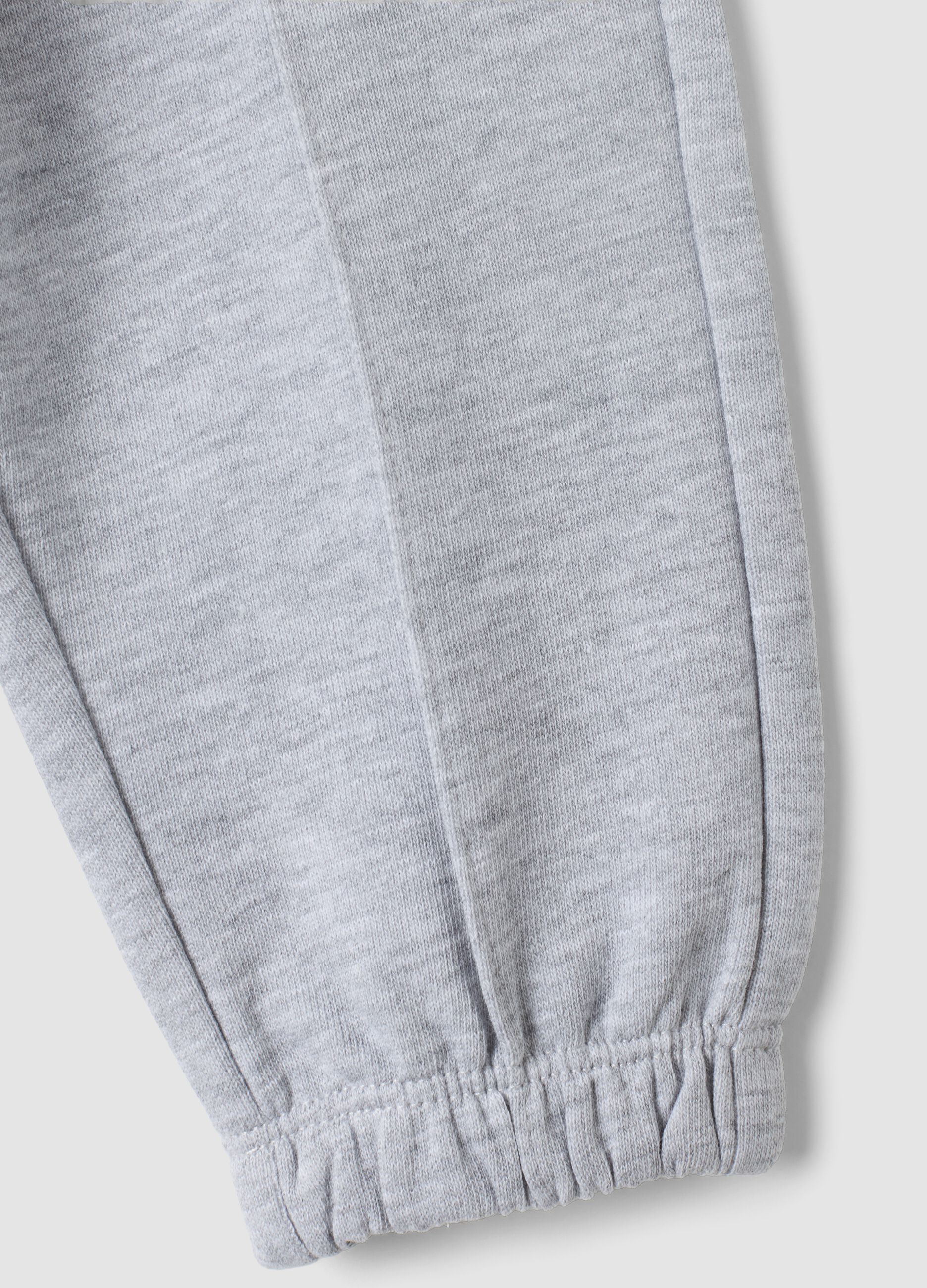 Grey pure cotton joggers with heart print, comfort fit for baby girl