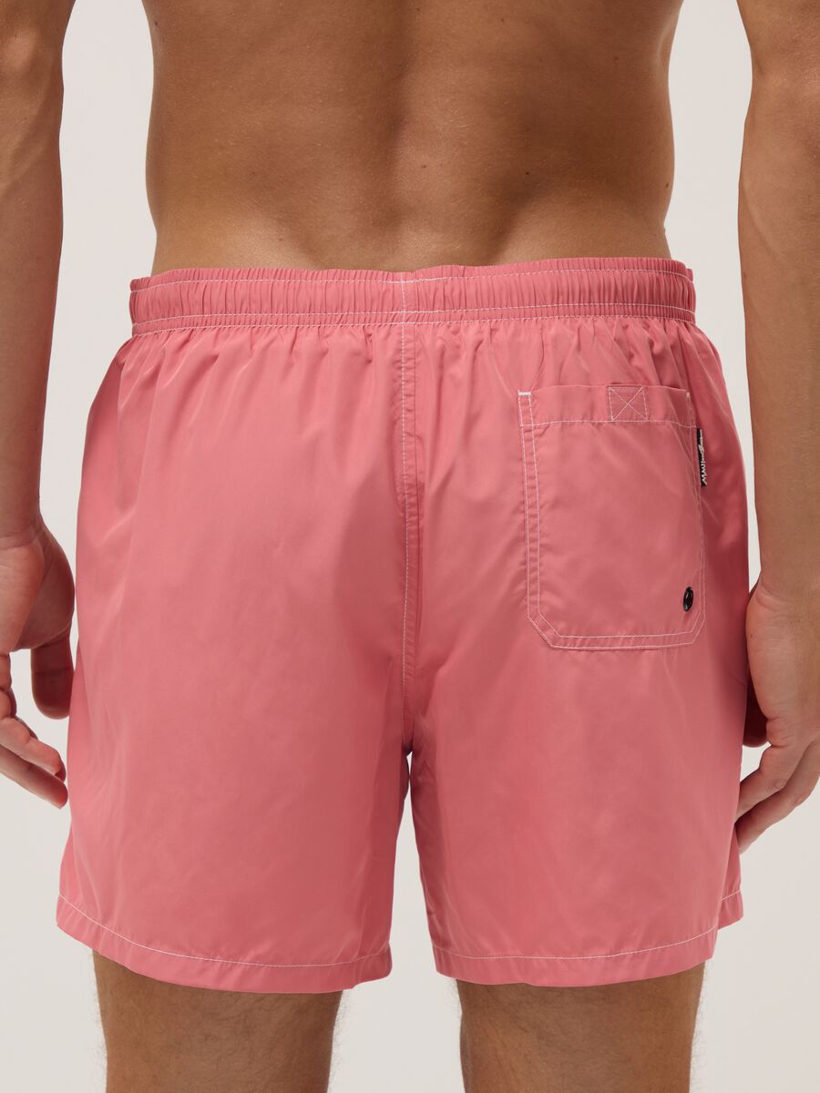 Pink swim shorts with elasticated waist_3
