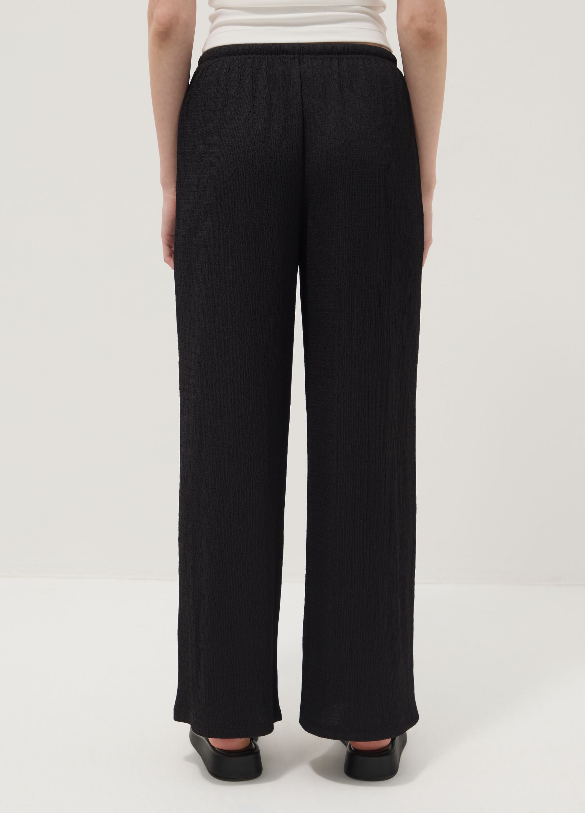 Black wide-leg jogger trousers