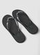 Black flip-flops with embellished straps and braided texture_1
